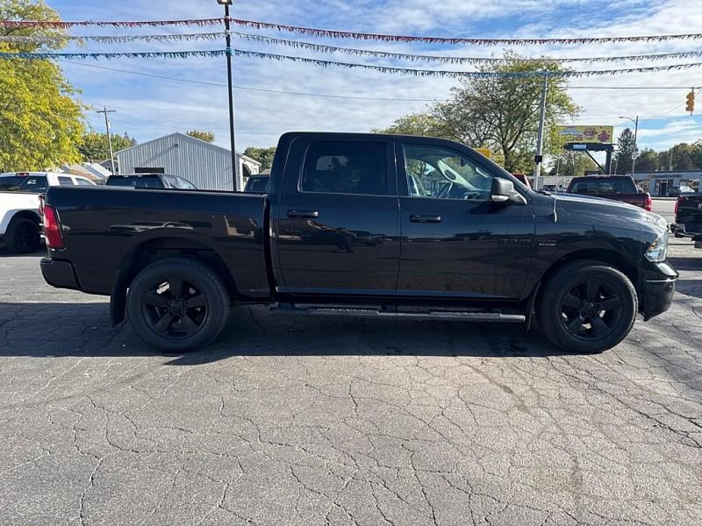 2018 BLACK /BLACK RAM 1500 SLT Crew Cab SWB 4WD (1C6RR7LT1JS) with an 5.7L V8 OHV 16V engine, 8A transmission, located at 3304 Woodville Road, Northwood, OH, 43619, (419) 210-8019, 41.612694, -83.480743 - Your #1 Destination for Auto Loans and mdash;No Matter Your Credit!At our dealership, we believe everyone deserves the opportunity to drive their dream car and mdash;whether you have good credit, bad credit, or no credit at all. With a wide selection of hundreds of cars, trucks, and SUVs, you'll fin - Photo#5