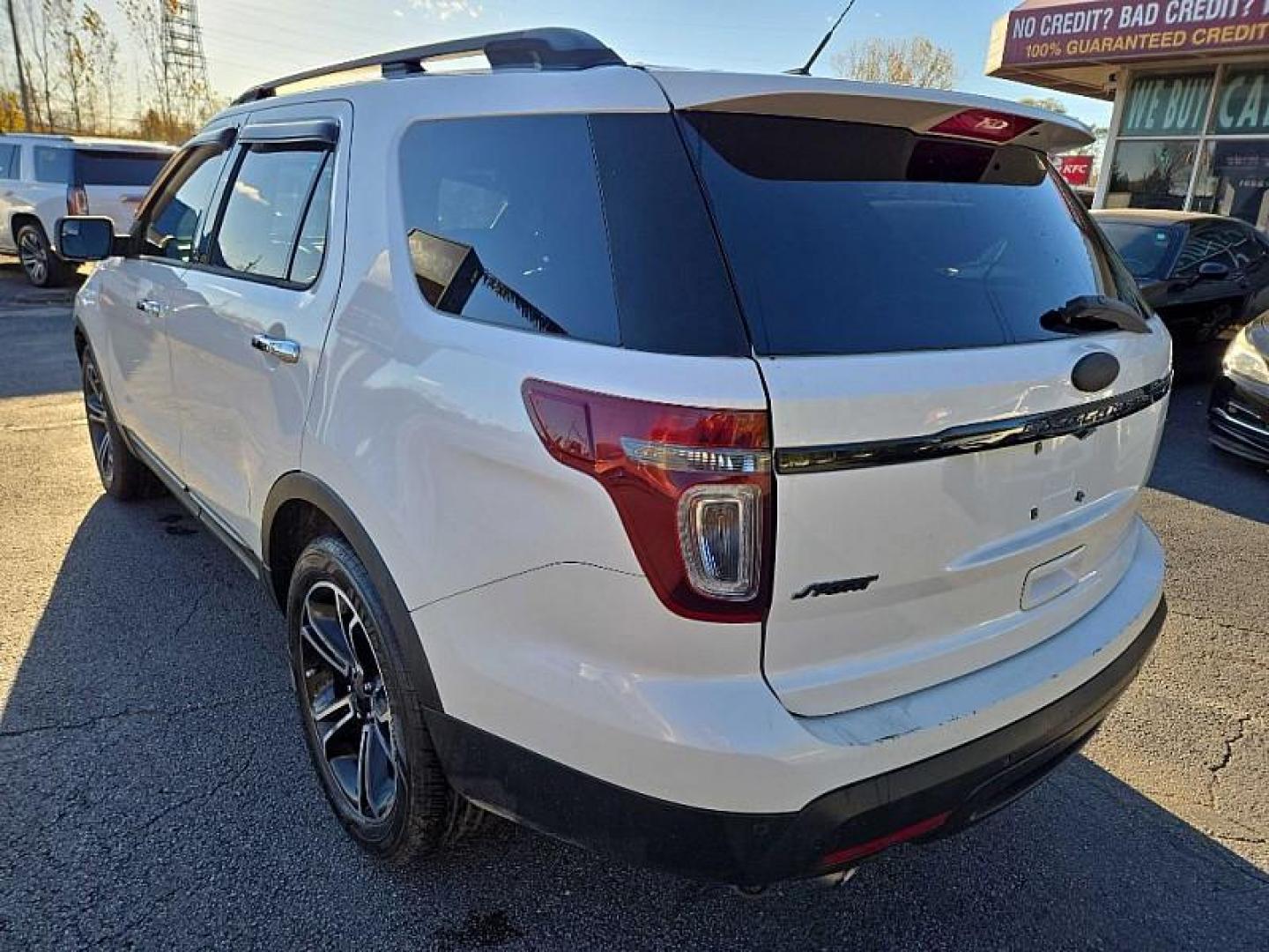2013 WHITE /BLACK Ford Explorer Sport 4WD (1FM5K8GT0DG) with an 3.5L V6 DOHC 24V engine, 6-Speed Automatic transmission, located at 3304 Woodville Road, Northwood, OH, 43619, (419) 210-8019, 41.612694, -83.480743 - Your #1 Destination for Auto Loans and mdash;No Matter Your Credit!At our dealership, we believe everyone deserves the opportunity to drive their dream car and mdash;whether you have good credit, bad credit, or no credit at all. With a wide selection of hundreds of cars, trucks, and SUVs, you'll fin - Photo#2