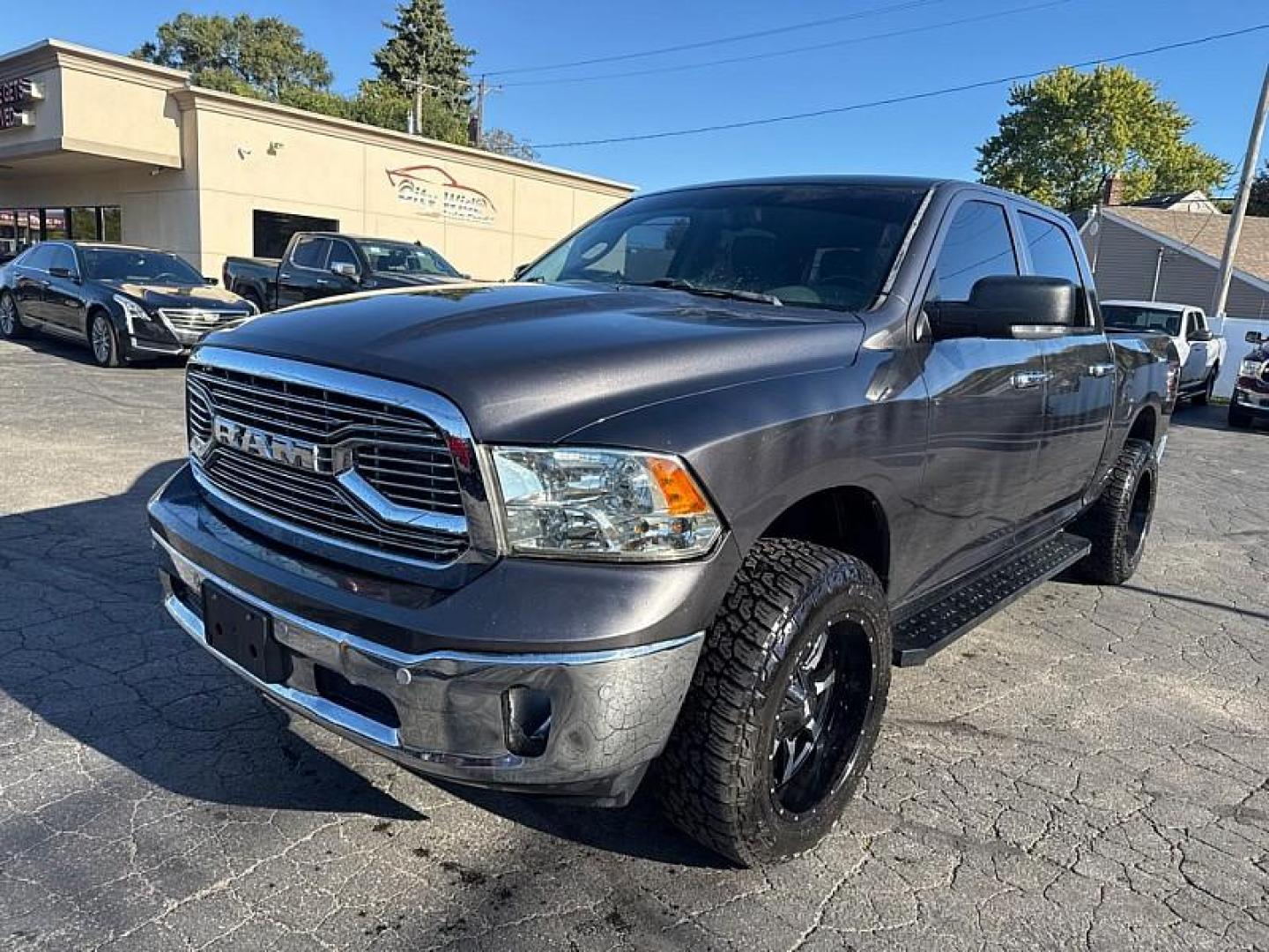 2016 GRAY /GRAY RAM 1500 SLT Crew Cab SWB 4WD (1C6RR7LG4GS) with an 3.6L V6 DOHC 24V FFV engine, 6A transmission, located at 3304 Woodville Road, Northwood, OH, 43619, (419) 210-8019, 41.612694, -83.480743 - Your #1 Destination for Auto Loans and mdash;No Matter Your Credit!At our dealership, we believe everyone deserves the opportunity to drive their dream car and mdash;whether you have good credit, bad credit, or no credit at all. With a wide selection of hundreds of cars, trucks, and SUVs, you'll fin - Photo#0