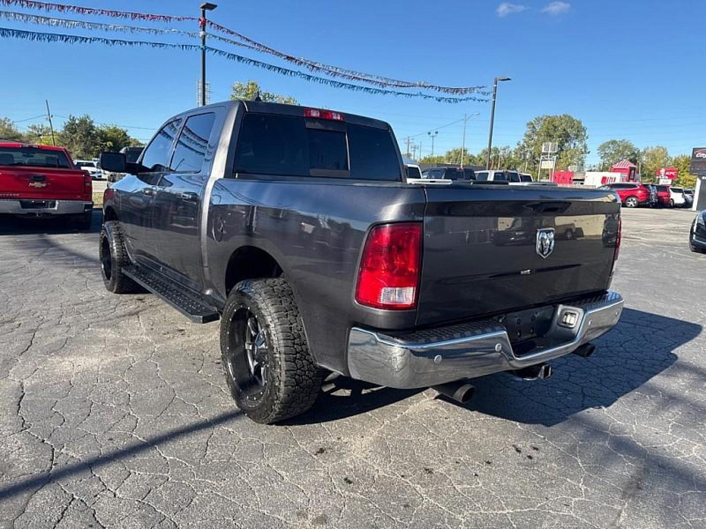 2016 GRAY /GRAY RAM 1500 SLT Crew Cab SWB 4WD (1C6RR7LG4GS) with an 3.6L V6 DOHC 24V FFV engine, 6A transmission, located at 3304 Woodville Road, Northwood, OH, 43619, (419) 210-8019, 41.612694, -83.480743 - Your #1 Destination for Auto Loans and mdash;No Matter Your Credit!At our dealership, we believe everyone deserves the opportunity to drive their dream car and mdash;whether you have good credit, bad credit, or no credit at all. With a wide selection of hundreds of cars, trucks, and SUVs, you'll fin - Photo#2