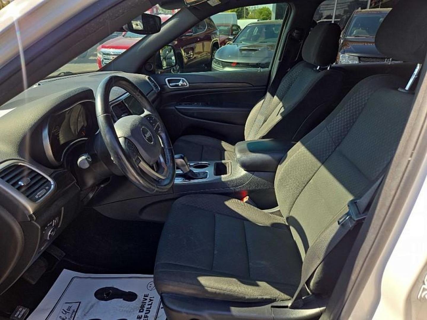 2020 WHITE /BLACK Jeep Grand Cherokee Laredo 4WD (1C4RJFAG9LC) with an 3.6L V6 DOHC 24V engine, 8A transmission, located at 3304 Woodville Road, Northwood, OH, 43619, (419) 210-8019, 41.612694, -83.480743 - Your #1 Destination for Auto Loans and mdash;No Matter Your Credit!At our dealership, we believe everyone deserves the opportunity to drive their dream car and mdash;whether you have good credit, bad credit, or no credit at all. With a wide selection of hundreds of cars, trucks, and SUVs, you'll fin - Photo#9