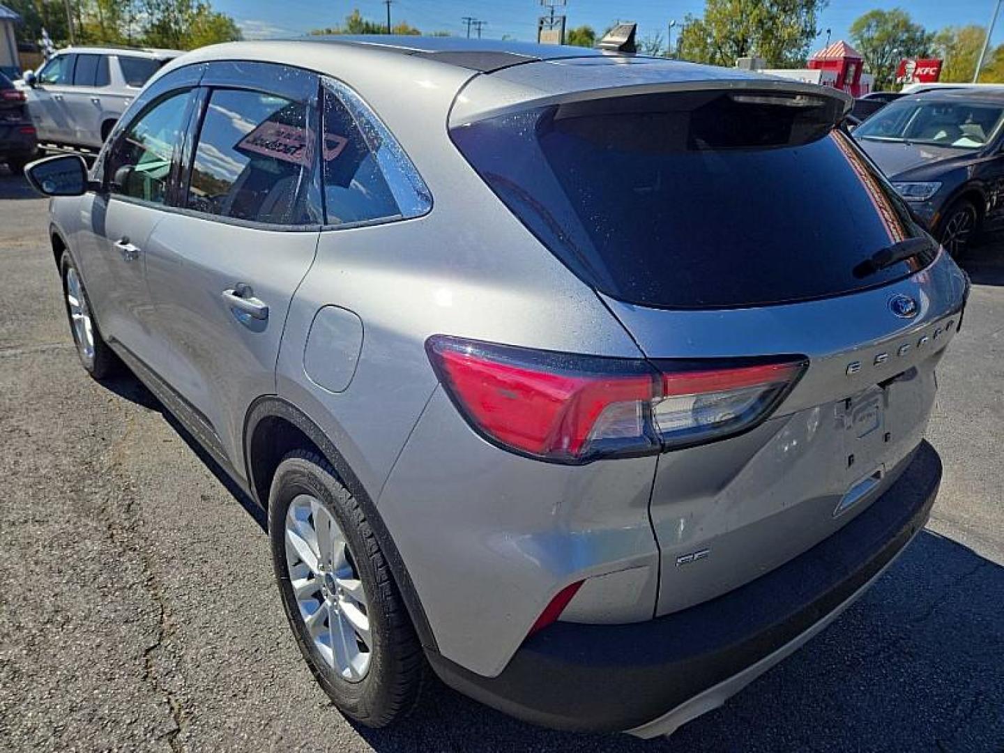 2021 SILVER /BLACK Ford Escape SE (1FMCU0G63MU) with an 1.5L L3 engine, 6A transmission, located at 3304 Woodville Road, Northwood, OH, 43619, (419) 210-8019, 41.612694, -83.480743 - Your #1 Destination for Auto Loans and mdash;No Matter Your Credit!At our dealership, we believe everyone deserves the opportunity to drive their dream car and mdash;whether you have good credit, bad credit, or no credit at all. With a wide selection of hundreds of cars, trucks, and SUVs, you'll fin - Photo#2