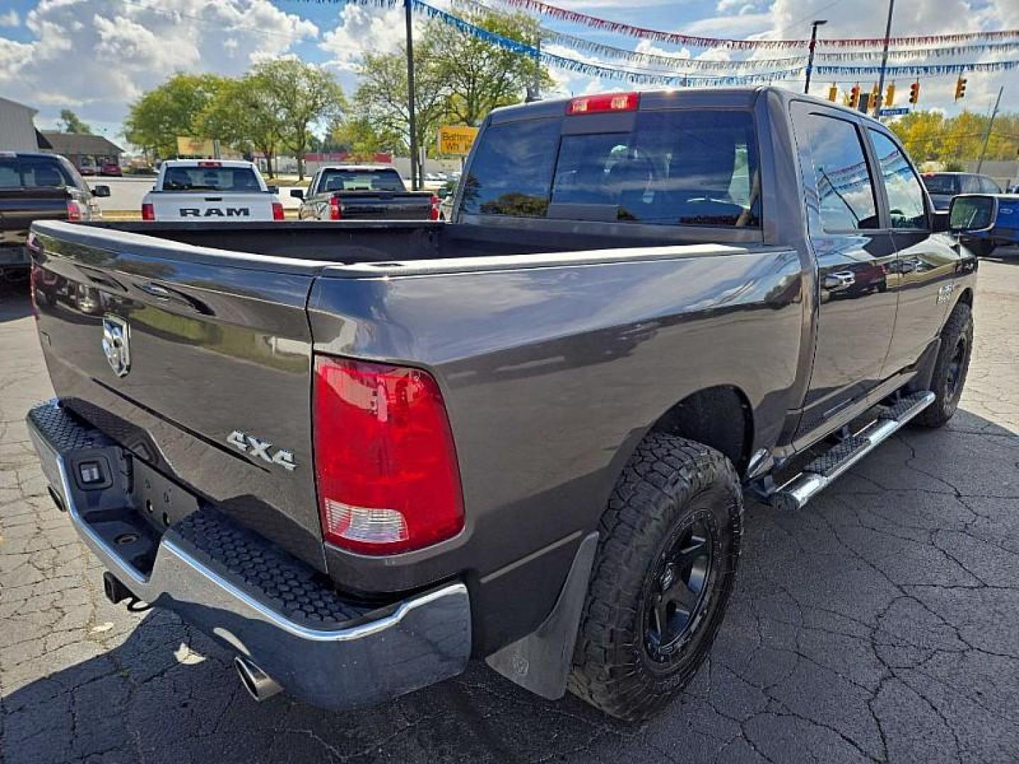 2018 GRAY /BLACK RAM 1500 SLT Crew Cab SWB 4WD (1C6RR7LM2JS) with an 3.0L V6 DIESEL engine, 8A transmission, located at 3304 Woodville Road, Northwood, OH, 43619, (419) 210-8019, 41.612694, -83.480743 - Your #1 Destination for Auto Loans and mdash;No Matter Your Credit!At our dealership, we believe everyone deserves the opportunity to drive their dream car and mdash;whether you have good credit, bad credit, or no credit at all. With a wide selection of hundreds of cars, trucks, and SUVs, you'll fin - Photo#4