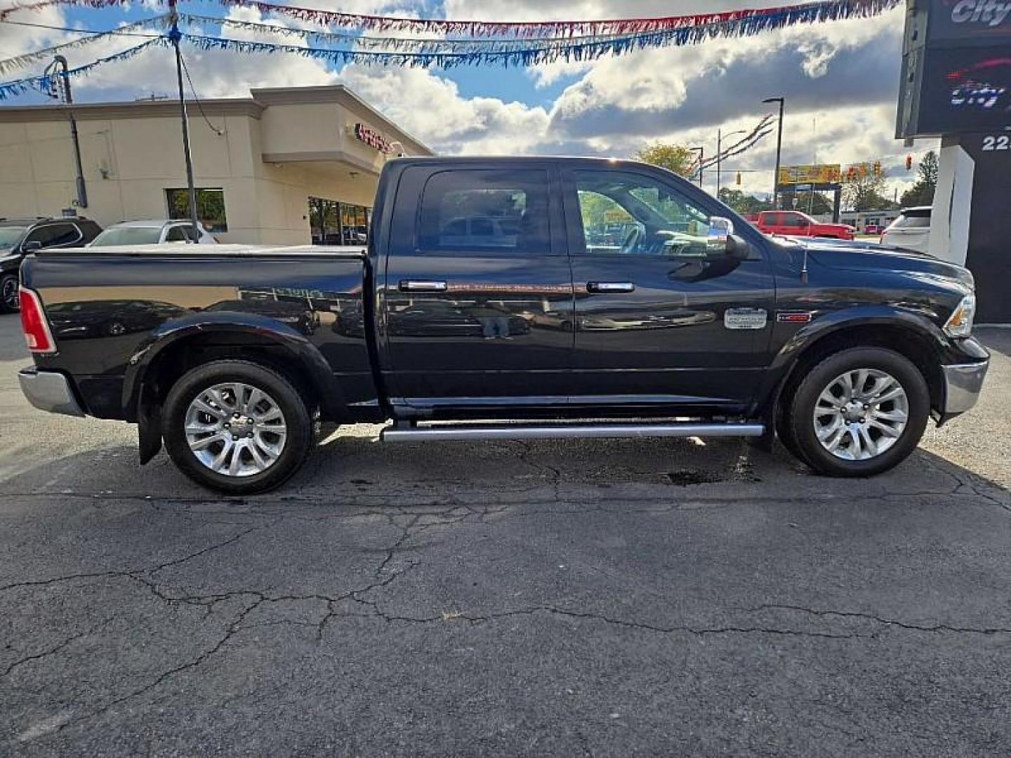 2017 BLACK /BROWN RAM 1500 Longhorn Crew Cab SWB 4WD (1C6RR7PM2HS) with an 3.0L V6 DIESEL engine, 8A transmission, located at 3304 Woodville Road, Northwood, OH, 43619, (419) 210-8019, 41.612694, -83.480743 - Your #1 Destination for Auto Loans and mdash;No Matter Your Credit!At our dealership, we believe everyone deserves the opportunity to drive their dream car and mdash;whether you have good credit, bad credit, or no credit at all. With a wide selection of hundreds of cars, trucks, and SUVs, you'll fin - Photo#5