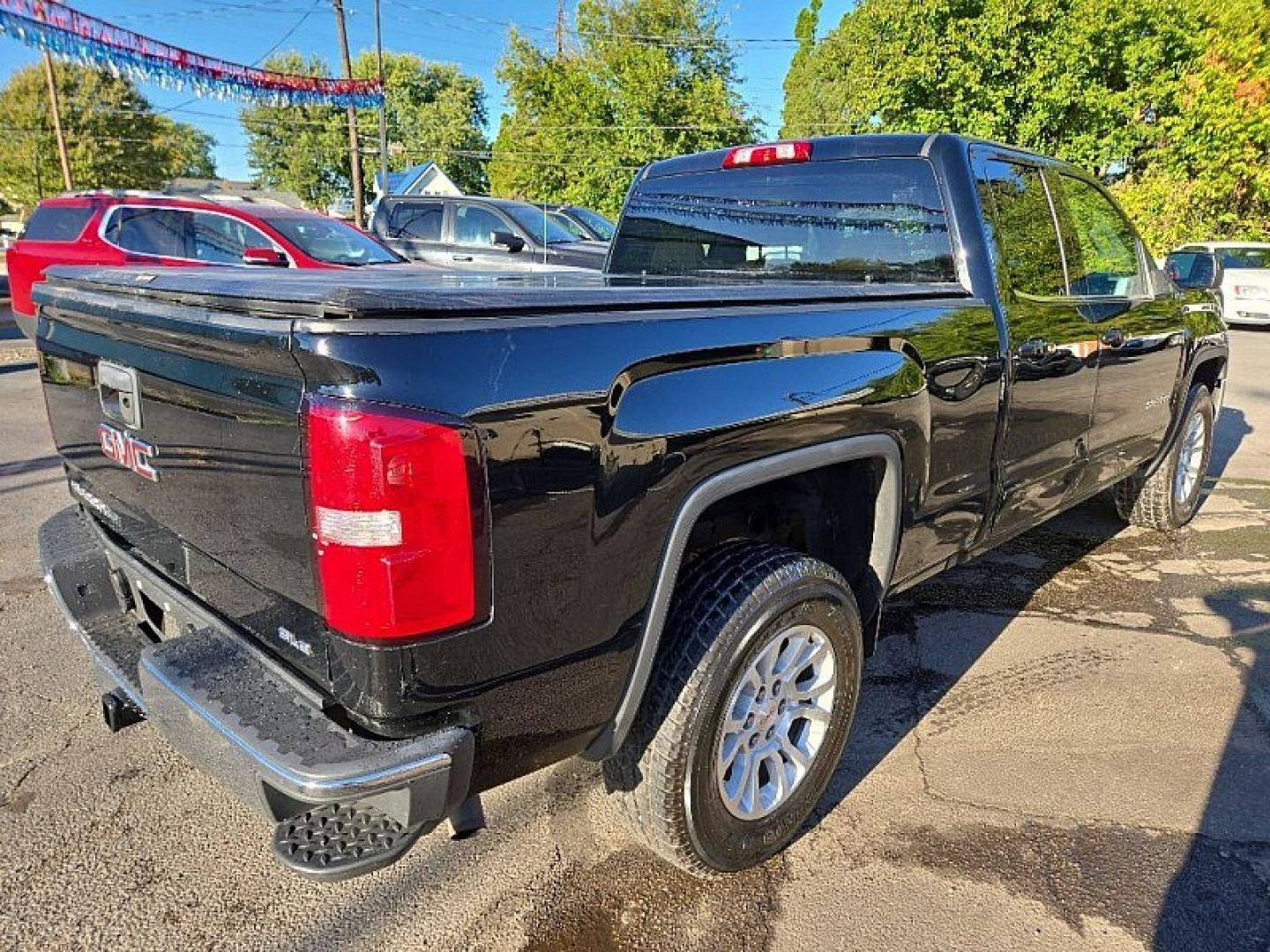 2019 BLACK /BLACK GMC Sierra 1500 SLE Double Cab 4WD (2GTV2MECXK1) with an 5.3L V8 OHV 16V engine, 6A transmission, located at 3304 Woodville Road, Northwood, OH, 43619, (419) 210-8019, 41.612694, -83.480743 - Your #1 Destination for Auto Loans and mdash;No Matter Your Credit!At our dealership, we believe everyone deserves the opportunity to drive their dream car and mdash;whether you have good credit, bad credit, or no credit at all. With a wide selection of hundreds of cars, trucks, and SUVs, you'll fin- Photo#3