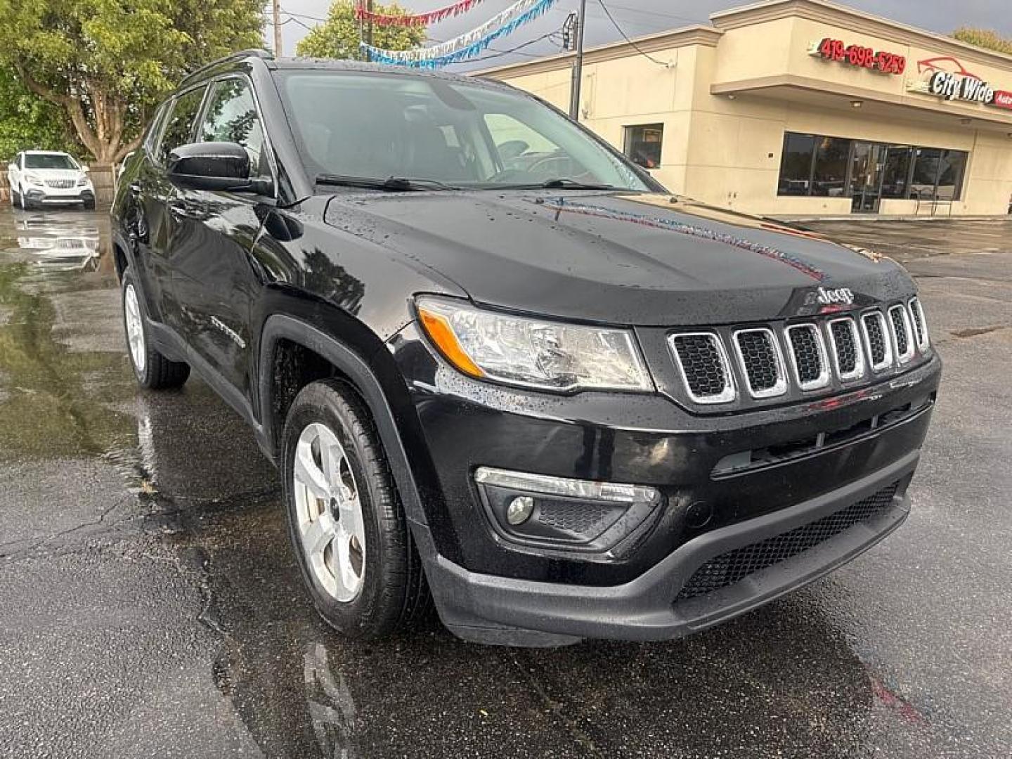 2018 BLACK /BLACK Jeep Compass Sport 4WD (3C4NJDBB9JT) with an 2.4L L4 DOHC 16V engine, Automatic 9-Spd transmission, located at 3304 Woodville Road, Northwood, OH, 43619, (419) 210-8019, 41.612694, -83.480743 - Your #1 Destination for Auto Loans and mdash;No Matter Your Credit!At our dealership, we believe everyone deserves the opportunity to drive their dream car and mdash;whether you have good credit, bad credit, or no credit at all. With a wide selection of hundreds of cars, trucks, and SUVs, you'll fin - Photo#6