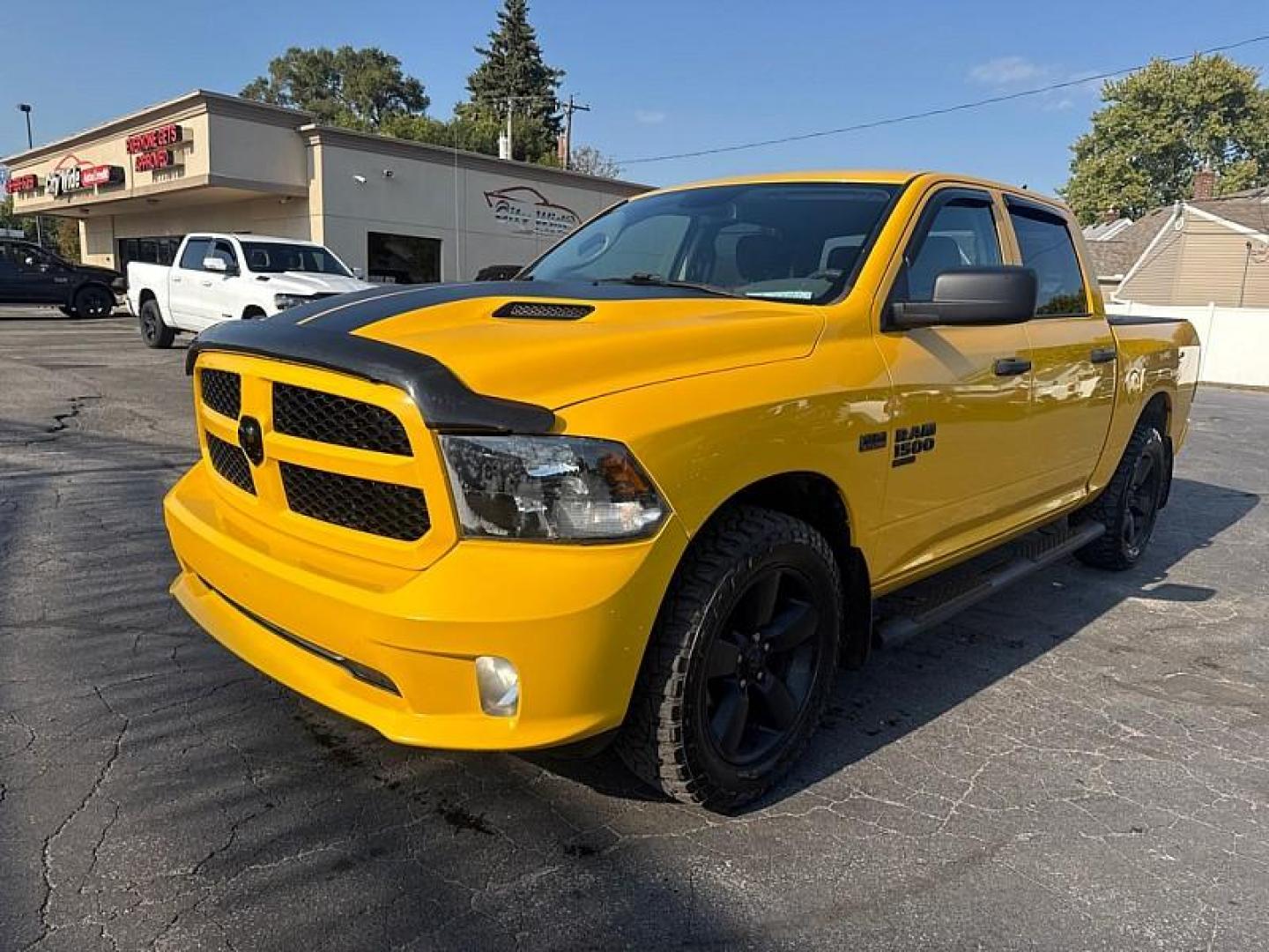 2019 YELLOW /BLACK RAM 1500 Tradesman Crew Cab SWB 4WD (1C6RR7KT3KS) with an 5.7L V8 OHV 16V engine, 8A transmission, located at 3304 Woodville Road, Northwood, OH, 43619, (419) 210-8019, 41.612694, -83.480743 - Your #1 Destination for Auto Loans and mdash;No Matter Your Credit!At our dealership, we believe everyone deserves the opportunity to drive their dream car and mdash;whether you have good credit, bad credit, or no credit at all. With a wide selection of hundreds of cars, trucks, and SUVs, you'll fin - Photo#0
