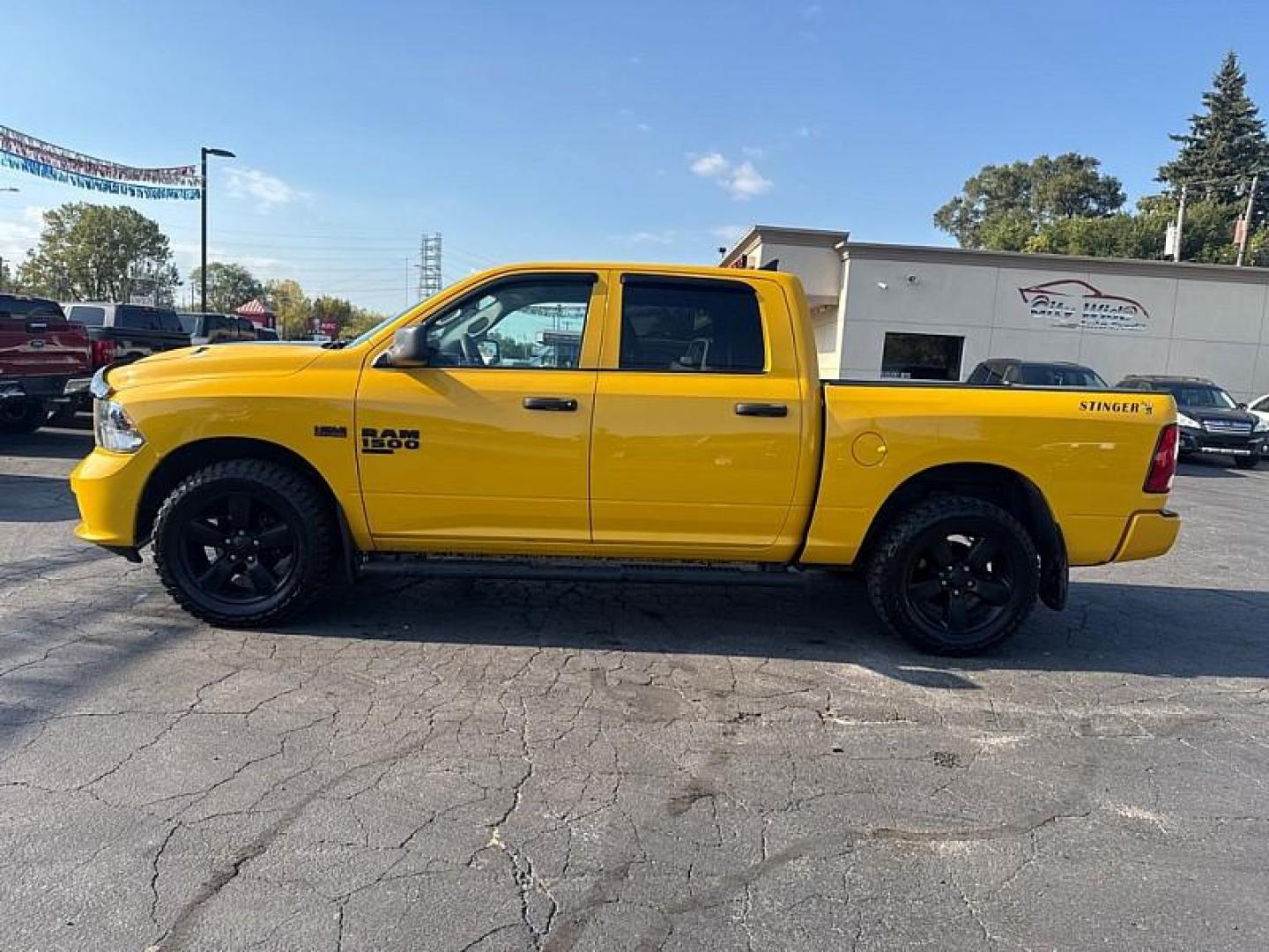 2019 YELLOW /BLACK RAM 1500 Tradesman Crew Cab SWB 4WD (1C6RR7KT3KS) with an 5.7L V8 OHV 16V engine, 8A transmission, located at 3304 Woodville Road, Northwood, OH, 43619, (419) 210-8019, 41.612694, -83.480743 - Your #1 Destination for Auto Loans and mdash;No Matter Your Credit!At our dealership, we believe everyone deserves the opportunity to drive their dream car and mdash;whether you have good credit, bad credit, or no credit at all. With a wide selection of hundreds of cars, trucks, and SUVs, you'll fin - Photo#1