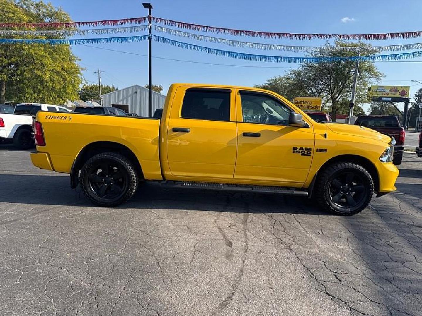 2019 YELLOW /BLACK RAM 1500 Tradesman Crew Cab SWB 4WD (1C6RR7KT3KS) with an 5.7L V8 OHV 16V engine, 8A transmission, located at 3304 Woodville Road, Northwood, OH, 43619, (419) 210-8019, 41.612694, -83.480743 - Your #1 Destination for Auto Loans and mdash;No Matter Your Credit!At our dealership, we believe everyone deserves the opportunity to drive their dream car and mdash;whether you have good credit, bad credit, or no credit at all. With a wide selection of hundreds of cars, trucks, and SUVs, you'll fin - Photo#5