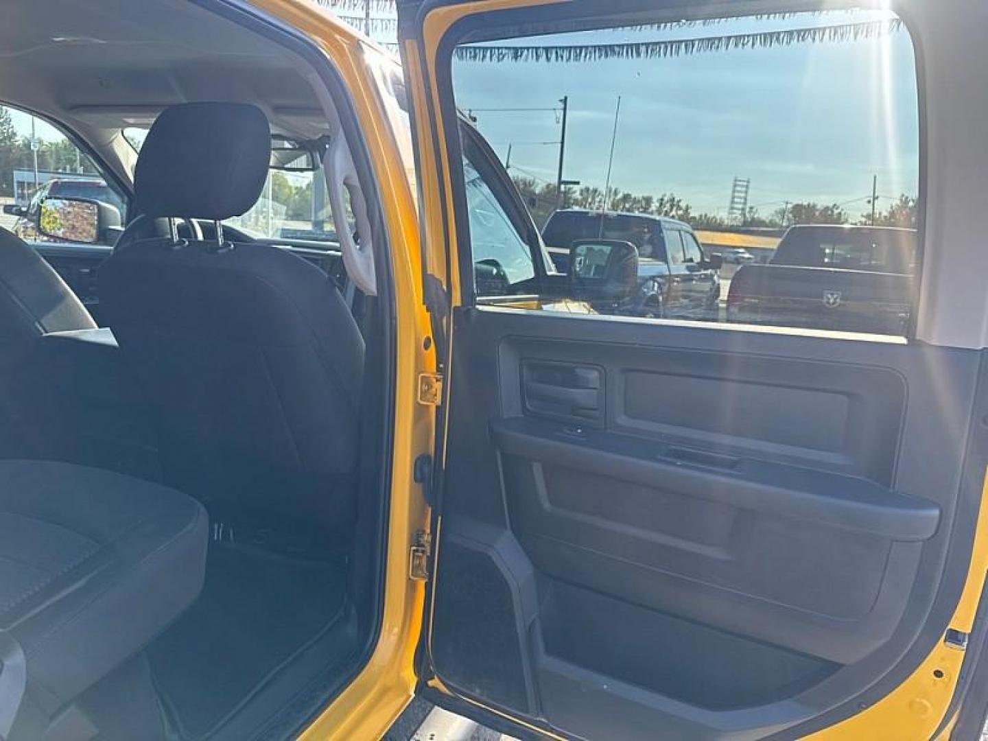 2019 YELLOW /BLACK RAM 1500 Tradesman Crew Cab SWB 4WD (1C6RR7KT3KS) with an 5.7L V8 OHV 16V engine, 8A transmission, located at 3304 Woodville Road, Northwood, OH, 43619, (419) 210-8019, 41.612694, -83.480743 - Your #1 Destination for Auto Loans and mdash;No Matter Your Credit!At our dealership, we believe everyone deserves the opportunity to drive their dream car and mdash;whether you have good credit, bad credit, or no credit at all. With a wide selection of hundreds of cars, trucks, and SUVs, you'll fin - Photo#12