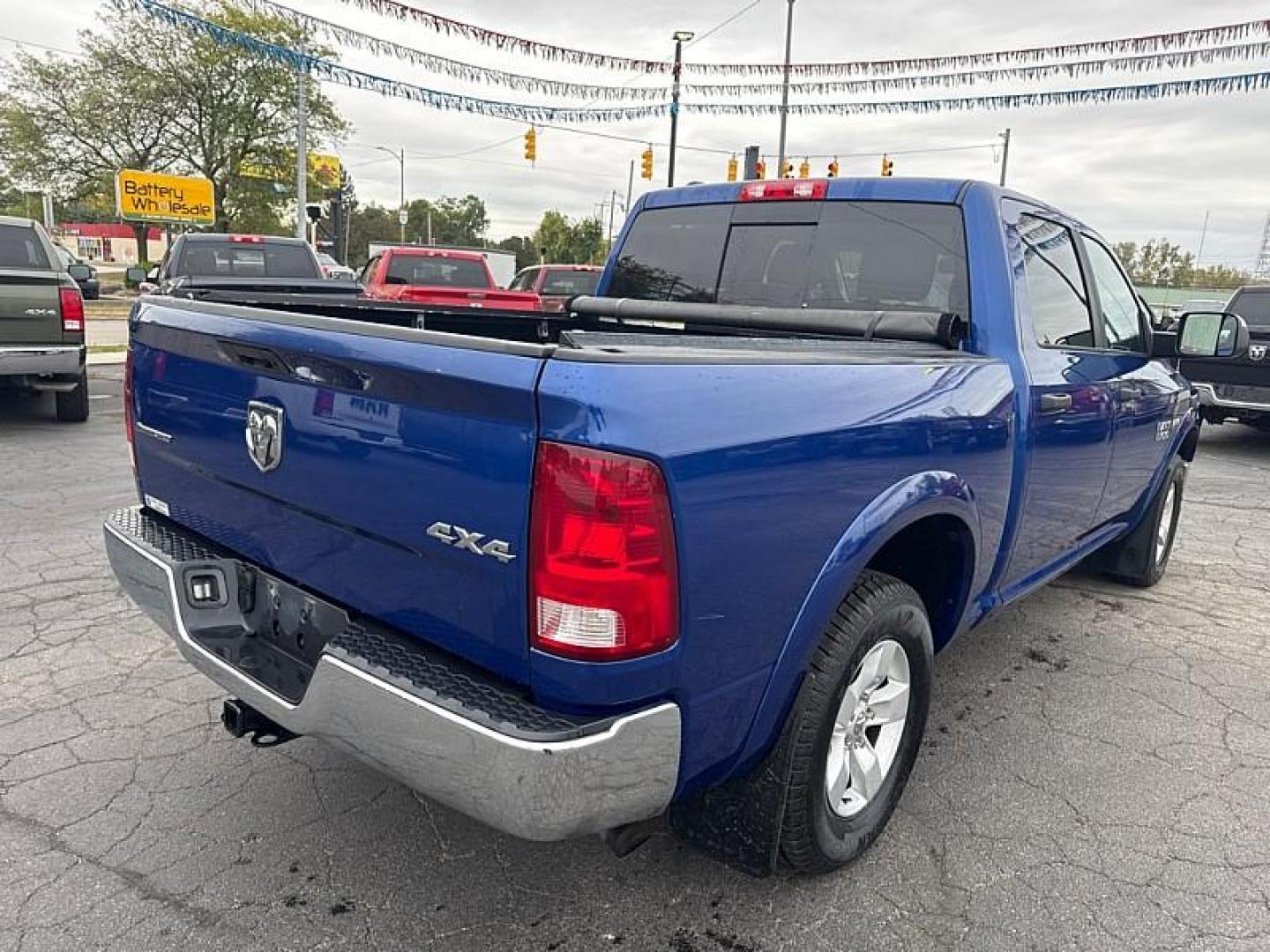 2015 BLUE /BLACK RAM 1500 SLT Crew Cab SWB 4WD (1C6RR7LT8FS) with an 5.7L V8 OHV 16V engine, 6-Speed Automatic transmission, located at 3304 Woodville Road, Northwood, OH, 43619, (419) 210-8019, 41.612694, -83.480743 - Your #1 Destination for Auto Loans and mdash;No Matter Your Credit!At our dealership, we believe everyone deserves the opportunity to drive their dream car and mdash;whether you have good credit, bad credit, or no credit at all. With a wide selection of hundreds of cars, trucks, and SUVs, you'll fin - Photo#4