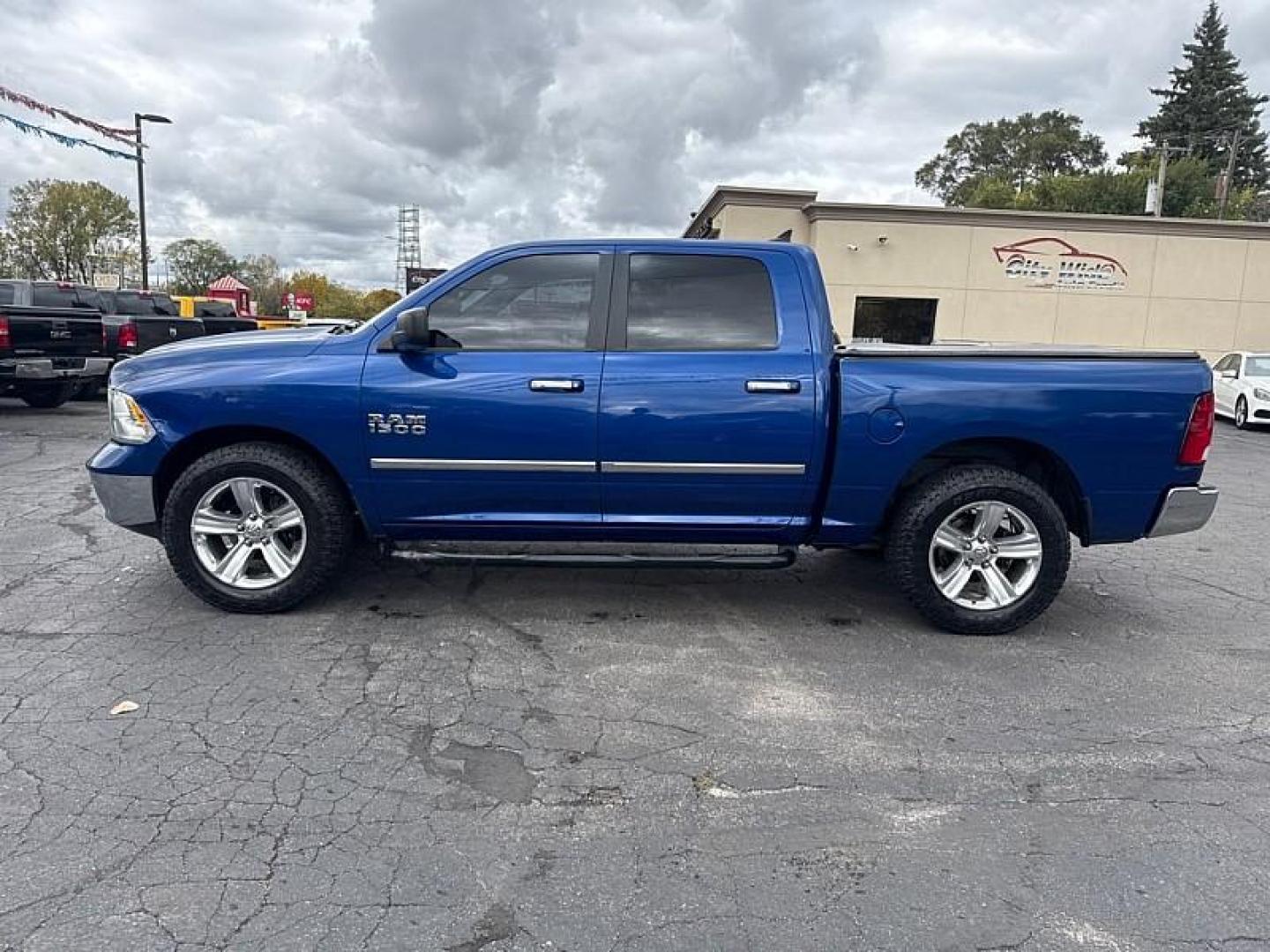 2014 BLUE /BLACK RAM 1500 SLT Crew Cab SWB 2WD (1C6RR6LG5ES) with an 3.6L V6 DOHC 24V FFV engine, 6-Speed Automatic transmission, located at 3304 Woodville Road, Northwood, OH, 43619, (419) 210-8019, 41.612694, -83.480743 - Your #1 Destination for Auto Loans and mdash;No Matter Your Credit!At our dealership, we believe everyone deserves the opportunity to drive their dream car and mdash;whether you have good credit, bad credit, or no credit at all. With a wide selection of hundreds of cars, trucks, and SUVs, you'll fin - Photo#1