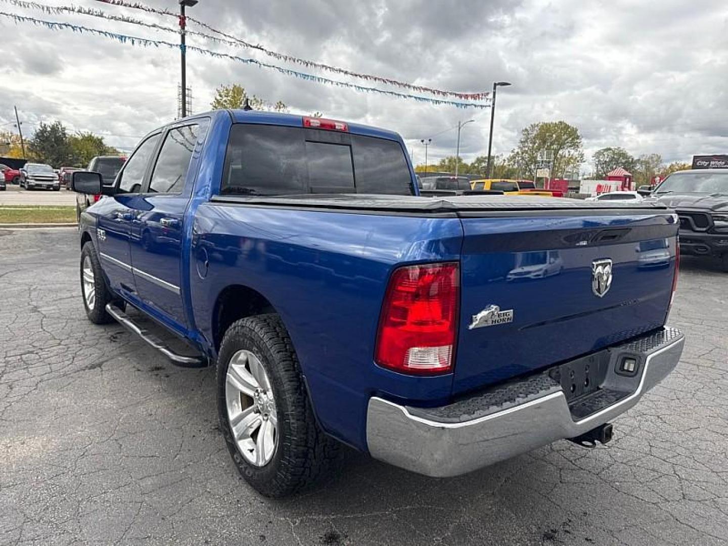 2014 BLUE /BLACK RAM 1500 SLT Crew Cab SWB 2WD (1C6RR6LG5ES) with an 3.6L V6 DOHC 24V FFV engine, 6-Speed Automatic transmission, located at 3304 Woodville Road, Northwood, OH, 43619, (419) 210-8019, 41.612694, -83.480743 - Your #1 Destination for Auto Loans and mdash;No Matter Your Credit!At our dealership, we believe everyone deserves the opportunity to drive their dream car and mdash;whether you have good credit, bad credit, or no credit at all. With a wide selection of hundreds of cars, trucks, and SUVs, you'll fin - Photo#2