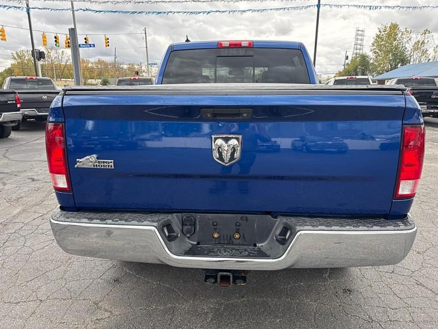 2014 BLUE /BLACK RAM 1500 SLT Crew Cab SWB 2WD (1C6RR6LG5ES) with an 3.6L V6 DOHC 24V FFV engine, 6-Speed Automatic transmission, located at 3304 Woodville Road, Northwood, OH, 43619, (419) 210-8019, 41.612694, -83.480743 - Your #1 Destination for Auto Loans and mdash;No Matter Your Credit!At our dealership, we believe everyone deserves the opportunity to drive their dream car and mdash;whether you have good credit, bad credit, or no credit at all. With a wide selection of hundreds of cars, trucks, and SUVs, you'll fin - Photo#3