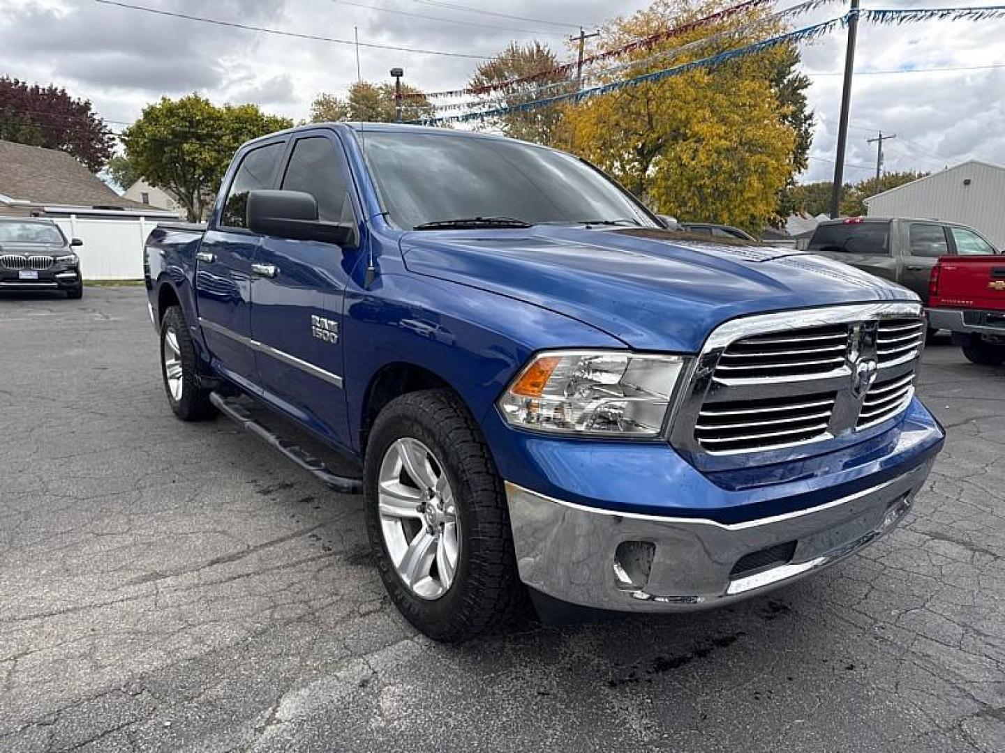 2014 BLUE /BLACK RAM 1500 SLT Crew Cab SWB 2WD (1C6RR6LG5ES) with an 3.6L V6 DOHC 24V FFV engine, 6-Speed Automatic transmission, located at 3304 Woodville Road, Northwood, OH, 43619, (419) 210-8019, 41.612694, -83.480743 - Your #1 Destination for Auto Loans and mdash;No Matter Your Credit!At our dealership, we believe everyone deserves the opportunity to drive their dream car and mdash;whether you have good credit, bad credit, or no credit at all. With a wide selection of hundreds of cars, trucks, and SUVs, you'll fin - Photo#6