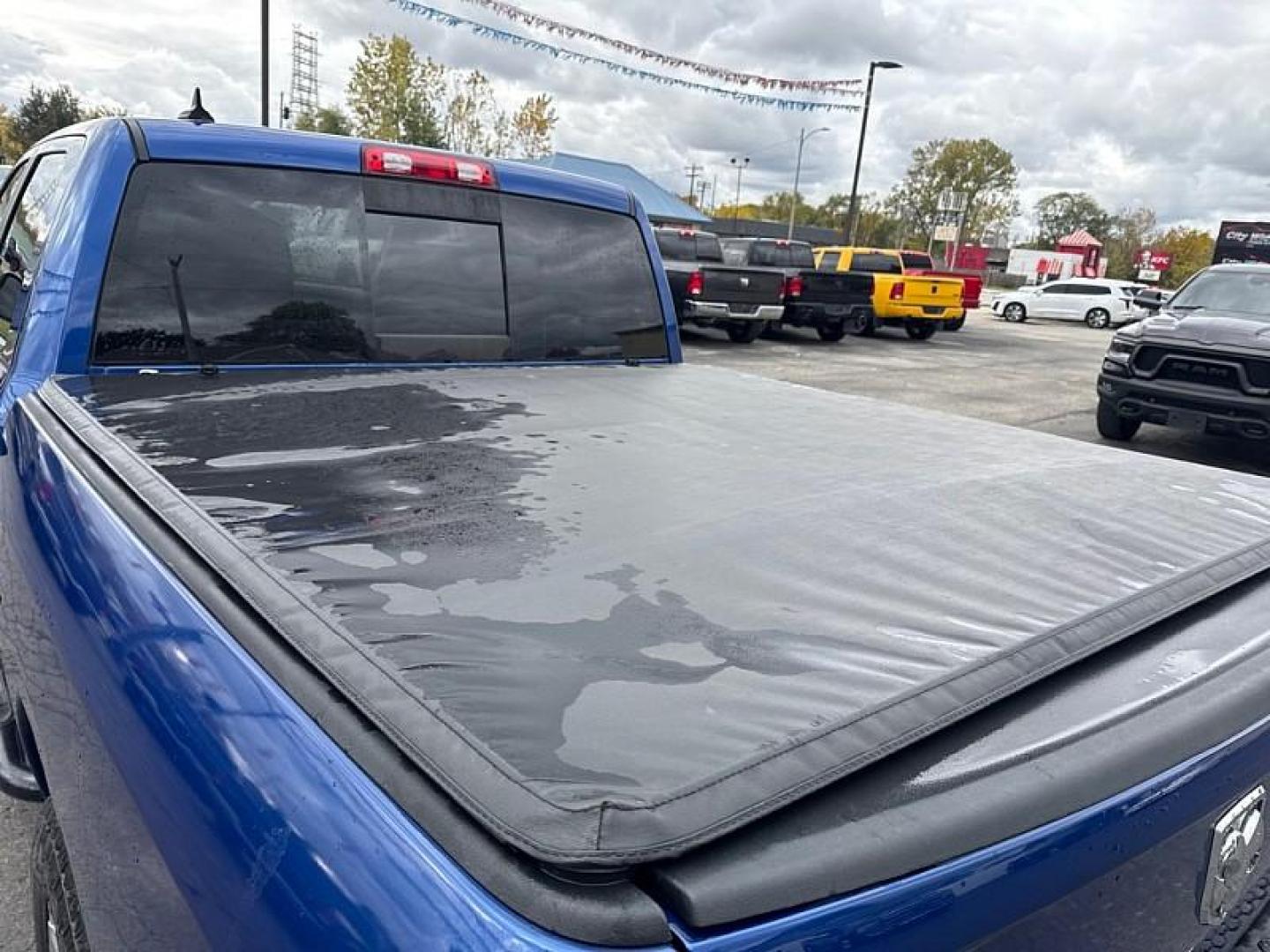 2014 BLUE /BLACK RAM 1500 SLT Crew Cab SWB 2WD (1C6RR6LG5ES) with an 3.6L V6 DOHC 24V FFV engine, 6-Speed Automatic transmission, located at 3304 Woodville Road, Northwood, OH, 43619, (419) 210-8019, 41.612694, -83.480743 - Your #1 Destination for Auto Loans and mdash;No Matter Your Credit!At our dealership, we believe everyone deserves the opportunity to drive their dream car and mdash;whether you have good credit, bad credit, or no credit at all. With a wide selection of hundreds of cars, trucks, and SUVs, you'll fin - Photo#12