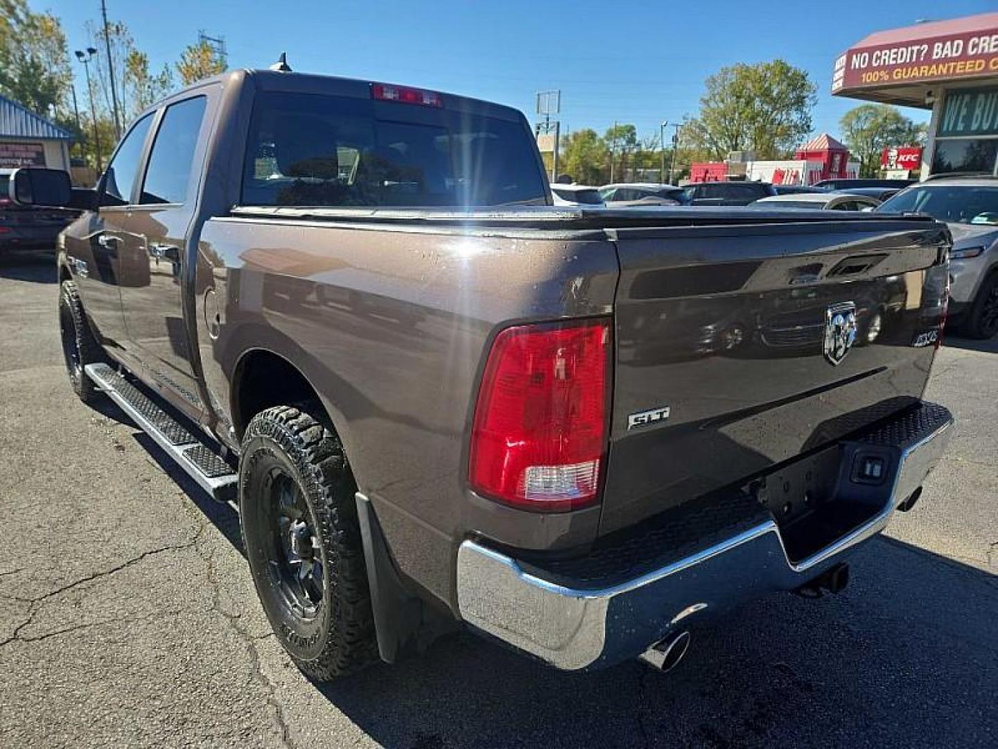 2018 BROWN /BLACK RAM 1500 SLT Crew Cab SWB 4WD (1C6RR7LM7JS) with an 3.0L V6 DIESEL engine, 8A transmission, located at 3304 Woodville Road, Northwood, OH, 43619, (419) 210-8019, 41.612694, -83.480743 - Your #1 Destination for Auto Loans and mdash;No Matter Your Credit!At our dealership, we believe everyone deserves the opportunity to drive their dream car and mdash;whether you have good credit, bad credit, or no credit at all. With a wide selection of hundreds of cars, trucks, and SUVs, you'll fin - Photo#3