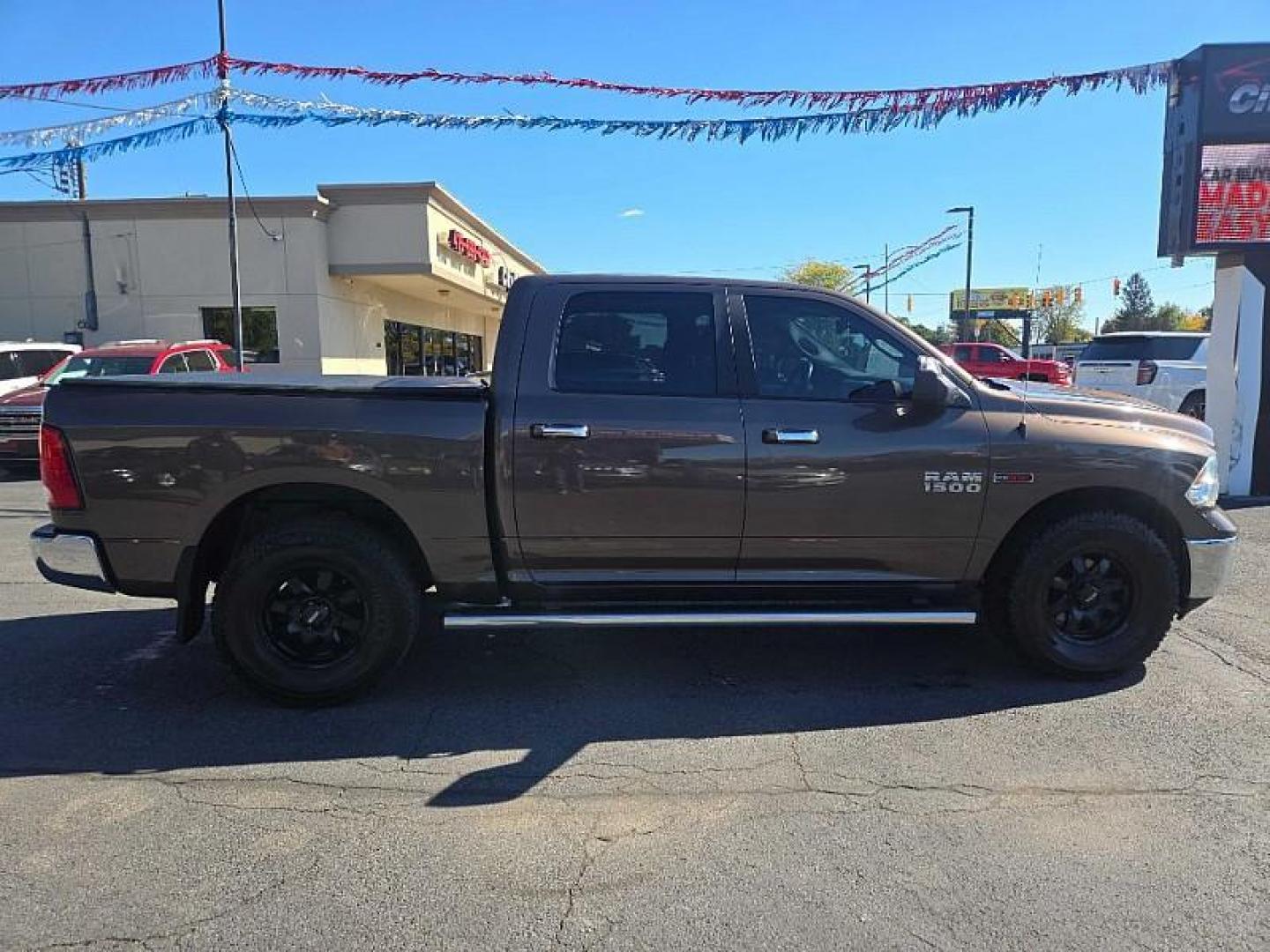 2018 BROWN /BLACK RAM 1500 SLT Crew Cab SWB 4WD (1C6RR7LM7JS) with an 3.0L V6 DIESEL engine, 8A transmission, located at 3304 Woodville Road, Northwood, OH, 43619, (419) 210-8019, 41.612694, -83.480743 - Your #1 Destination for Auto Loans and mdash;No Matter Your Credit!At our dealership, we believe everyone deserves the opportunity to drive their dream car and mdash;whether you have good credit, bad credit, or no credit at all. With a wide selection of hundreds of cars, trucks, and SUVs, you'll fin - Photo#5