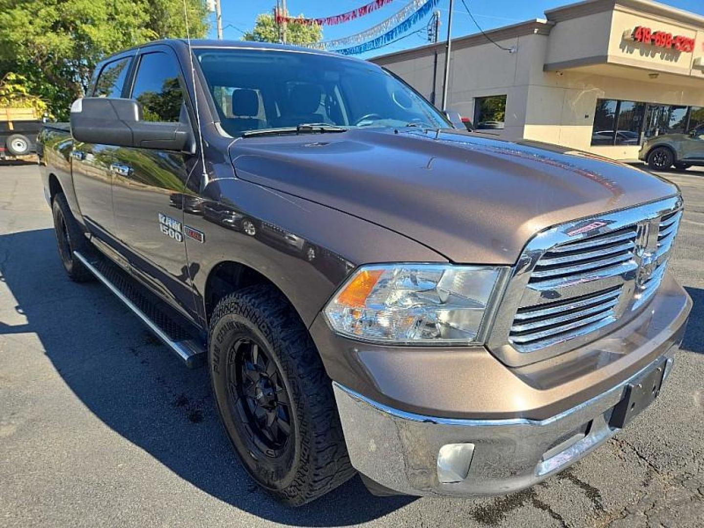 2018 BROWN /BLACK RAM 1500 SLT Crew Cab SWB 4WD (1C6RR7LM7JS) with an 3.0L V6 DIESEL engine, 8A transmission, located at 3304 Woodville Road, Northwood, OH, 43619, (419) 210-8019, 41.612694, -83.480743 - Your #1 Destination for Auto Loans and mdash;No Matter Your Credit!At our dealership, we believe everyone deserves the opportunity to drive their dream car and mdash;whether you have good credit, bad credit, or no credit at all. With a wide selection of hundreds of cars, trucks, and SUVs, you'll fin - Photo#6