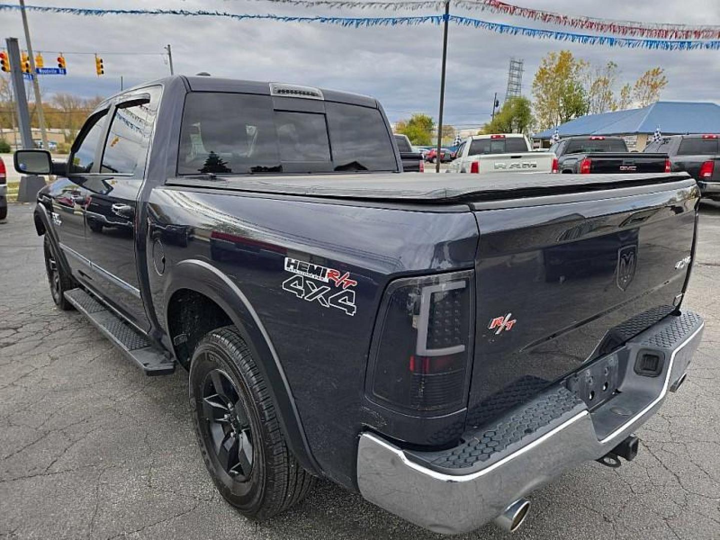 2016 GRAY /BLACK RAM 1500 SLT Crew Cab SWB 4WD (1C6RR7LT0GS) with an 5.7L V8 OHV 16V engine, 6A transmission, located at 3304 Woodville Road, Northwood, OH, 43619, (419) 210-8019, 41.612694, -83.480743 - Your #1 Destination for Auto Loans and mdash;No Matter Your Credit!At our dealership, we believe everyone deserves the opportunity to drive their dream car and mdash;whether you have good credit, bad credit, or no credit at all. With a wide selection of hundreds of cars, trucks, and SUVs, you'll fin - Photo#2