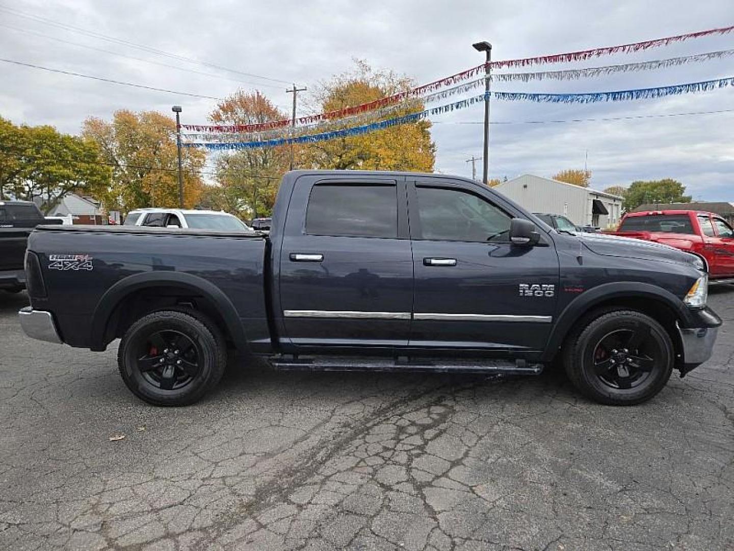 2016 GRAY /BLACK RAM 1500 SLT Crew Cab SWB 4WD (1C6RR7LT0GS) with an 5.7L V8 OHV 16V engine, 6A transmission, located at 3304 Woodville Road, Northwood, OH, 43619, (419) 210-8019, 41.612694, -83.480743 - Your #1 Destination for Auto Loans and mdash;No Matter Your Credit!At our dealership, we believe everyone deserves the opportunity to drive their dream car and mdash;whether you have good credit, bad credit, or no credit at all. With a wide selection of hundreds of cars, trucks, and SUVs, you'll fin - Photo#5