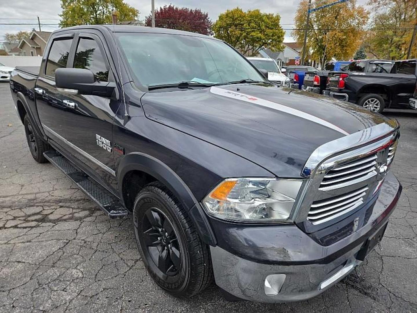 2016 GRAY /BLACK RAM 1500 SLT Crew Cab SWB 4WD (1C6RR7LT0GS) with an 5.7L V8 OHV 16V engine, 6A transmission, located at 3304 Woodville Road, Northwood, OH, 43619, (419) 210-8019, 41.612694, -83.480743 - Your #1 Destination for Auto Loans and mdash;No Matter Your Credit!At our dealership, we believe everyone deserves the opportunity to drive their dream car and mdash;whether you have good credit, bad credit, or no credit at all. With a wide selection of hundreds of cars, trucks, and SUVs, you'll fin - Photo#6