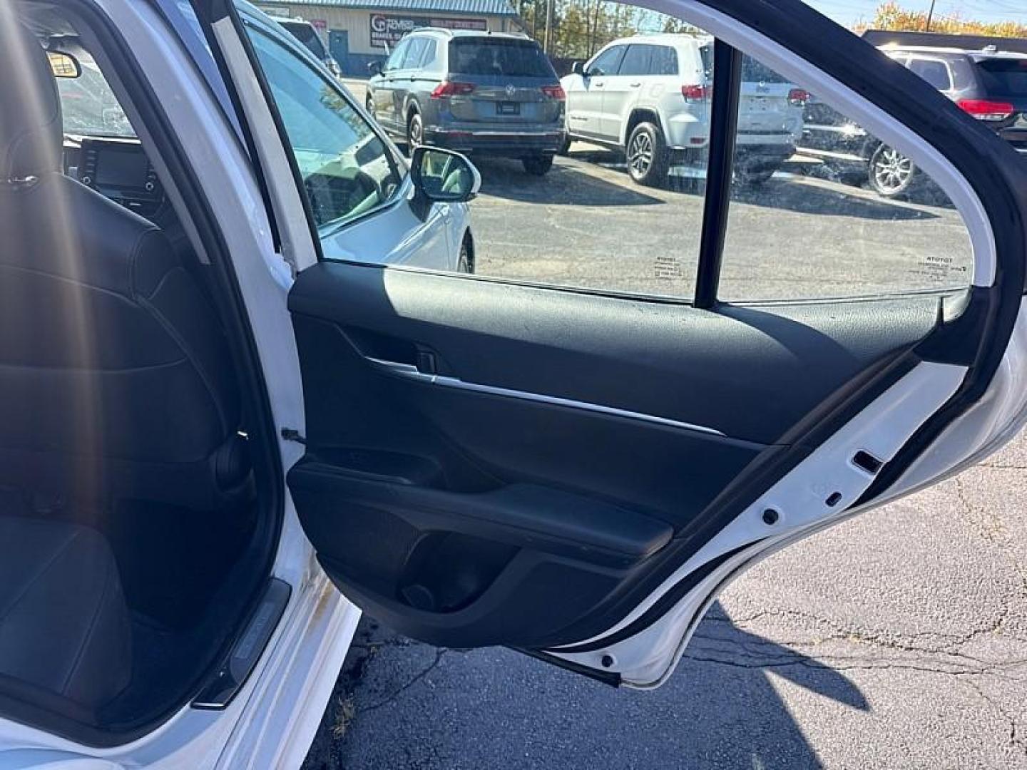 2021 WHITE /BLACK Toyota Camry SE (4T1G11AKXMU) with an 2.5L L4 DOHC 16V engine, 8A transmission, located at 3304 Woodville Road, Northwood, OH, 43619, (419) 210-8019, 41.612694, -83.480743 - Your #1 Destination for Auto Loans and mdash;No Matter Your Credit!At our dealership, we believe everyone deserves the opportunity to drive their dream car and mdash;whether you have good credit, bad credit, or no credit at all. With a wide selection of hundreds of cars, trucks, and SUVs, you'll fin - Photo#12