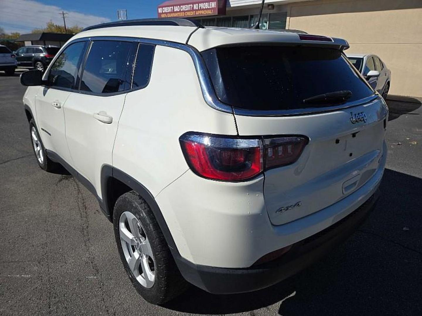 2018 WHITE /BLACK Jeep Compass Sport 4WD (3C4NJDBB0JT) with an 2.4L L4 DOHC 16V engine, Automatic 9-Spd transmission, located at 3304 Woodville Road, Northwood, OH, 43619, (419) 210-8019, 41.612694, -83.480743 - Your #1 Destination for Auto Loans and mdash;No Matter Your Credit!At our dealership, we believe everyone deserves the opportunity to drive their dream car and mdash;whether you have good credit, bad credit, or no credit at all. With a wide selection of hundreds of cars, trucks, and SUVs, you'll fin - Photo#2