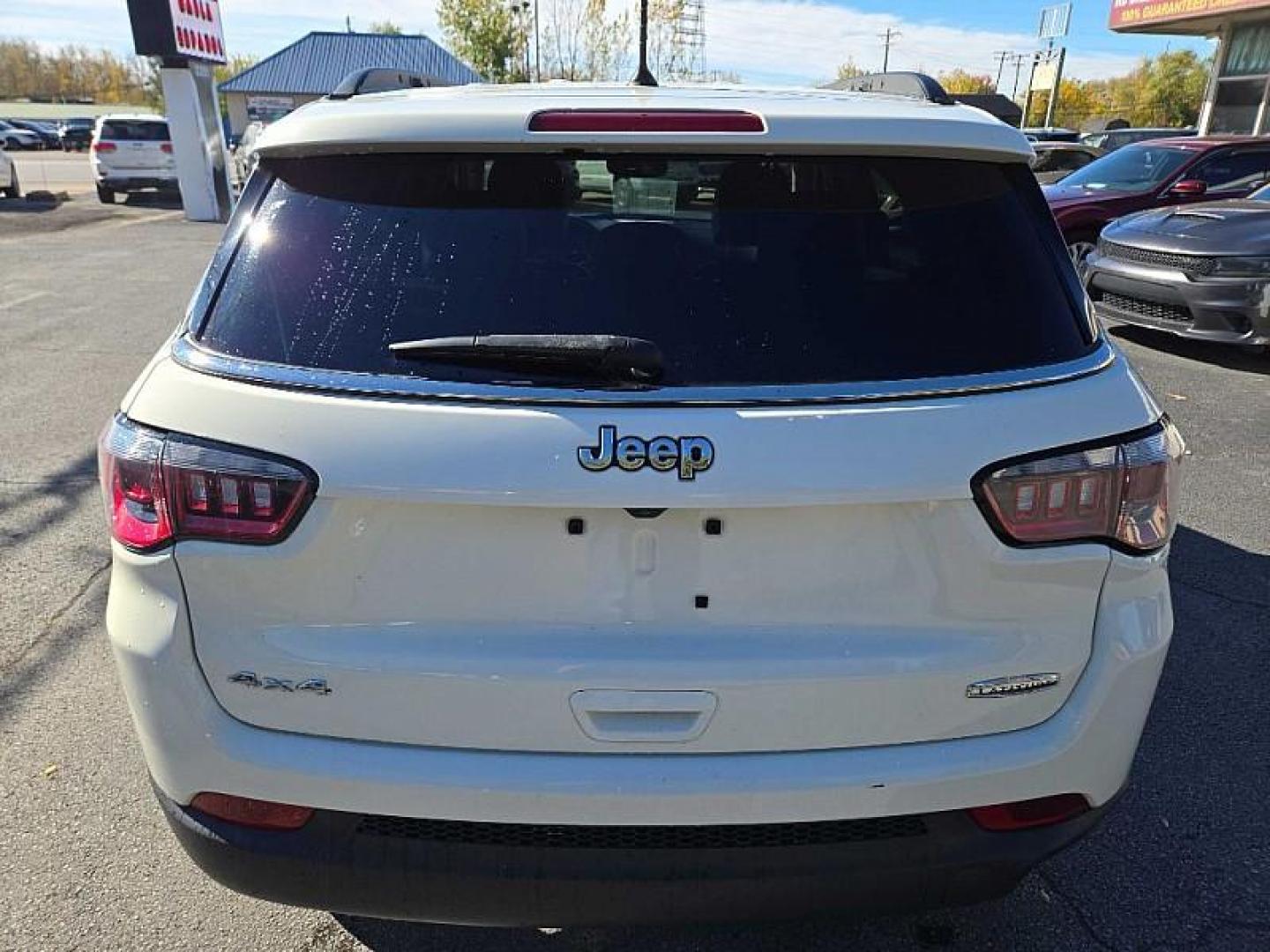 2018 WHITE /BLACK Jeep Compass Sport 4WD (3C4NJDBB0JT) with an 2.4L L4 DOHC 16V engine, Automatic 9-Spd transmission, located at 3304 Woodville Road, Northwood, OH, 43619, (419) 210-8019, 41.612694, -83.480743 - Your #1 Destination for Auto Loans and mdash;No Matter Your Credit!At our dealership, we believe everyone deserves the opportunity to drive their dream car and mdash;whether you have good credit, bad credit, or no credit at all. With a wide selection of hundreds of cars, trucks, and SUVs, you'll fin - Photo#3
