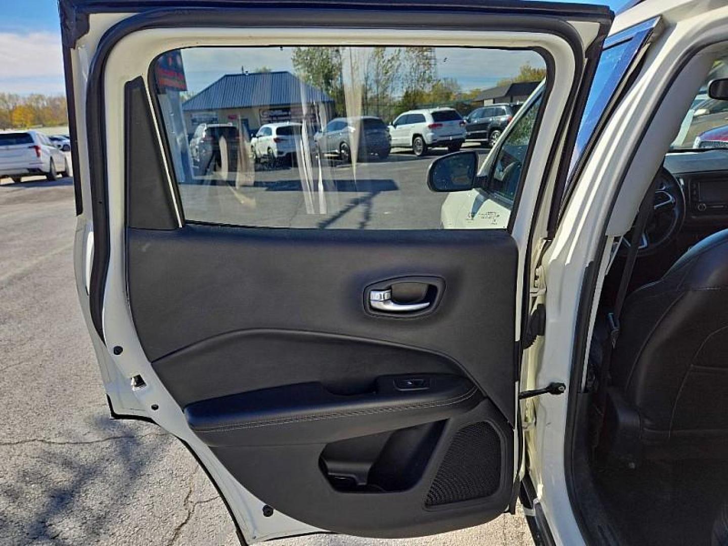 2018 WHITE /BLACK Jeep Compass Sport 4WD (3C4NJDBB0JT) with an 2.4L L4 DOHC 16V engine, Automatic 9-Spd transmission, located at 3304 Woodville Road, Northwood, OH, 43619, (419) 210-8019, 41.612694, -83.480743 - Your #1 Destination for Auto Loans and mdash;No Matter Your Credit!At our dealership, we believe everyone deserves the opportunity to drive their dream car and mdash;whether you have good credit, bad credit, or no credit at all. With a wide selection of hundreds of cars, trucks, and SUVs, you'll fin - Photo#10