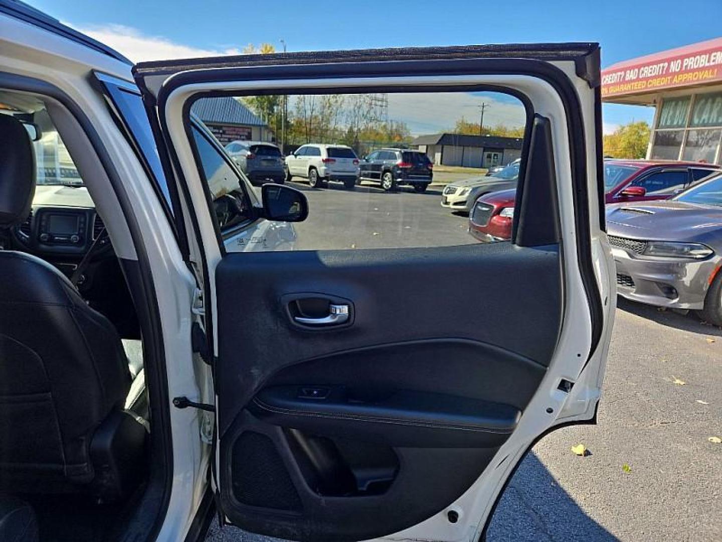 2018 WHITE /BLACK Jeep Compass Sport 4WD (3C4NJDBB0JT) with an 2.4L L4 DOHC 16V engine, Automatic 9-Spd transmission, located at 3304 Woodville Road, Northwood, OH, 43619, (419) 210-8019, 41.612694, -83.480743 - Your #1 Destination for Auto Loans and mdash;No Matter Your Credit!At our dealership, we believe everyone deserves the opportunity to drive their dream car and mdash;whether you have good credit, bad credit, or no credit at all. With a wide selection of hundreds of cars, trucks, and SUVs, you'll fin - Photo#13