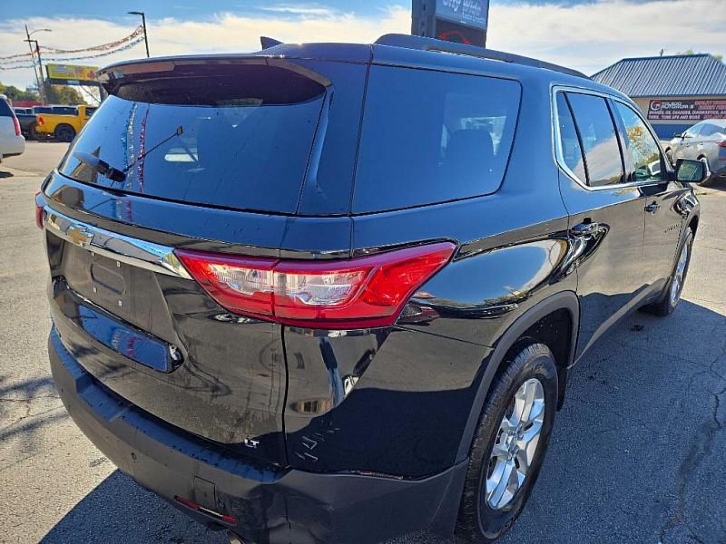 2021 BLACK /BLACK Chevrolet Traverse LT Cloth AWD (1GNEVGKW7MJ) with an 3.6L V6 DOHC 24V engine, 9A transmission, located at 3304 Woodville Road, Northwood, OH, 43619, (419) 210-8019, 41.612694, -83.480743 - Photo#2