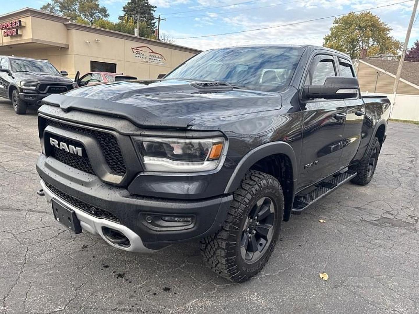 2019 GRAY /BLACK RAM 1500 Rebel Quad Cab 4WD (1C6SRFET0KN) with an 3.6L V6 FFV engine, 8A transmission, located at 3304 Woodville Road, Northwood, OH, 43619, (419) 210-8019, 41.612694, -83.480743 - Your #1 Destination for Auto Loans and mdash;No Matter Your Credit!At our dealership, we believe everyone deserves the opportunity to drive their dream car and mdash;whether you have good credit, bad credit, or no credit at all. With a wide selection of hundreds of cars, trucks, and SUVs, you'll fin - Photo#0
