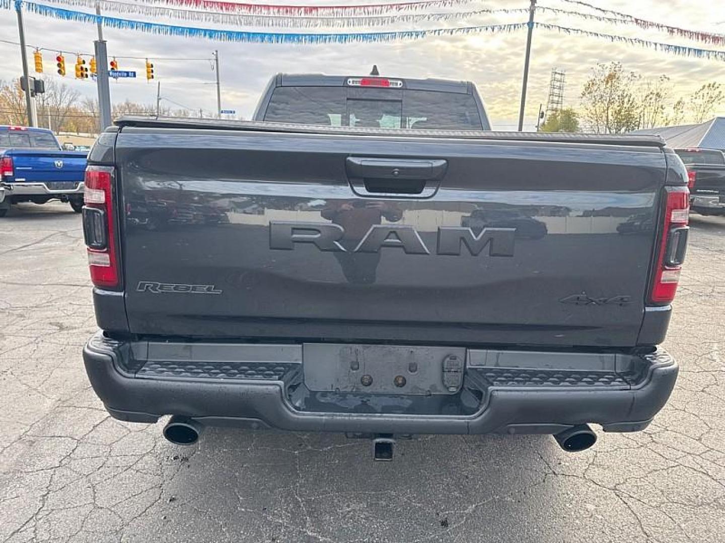 2019 GRAY /BLACK RAM 1500 Rebel Quad Cab 4WD (1C6SRFET0KN) with an 3.6L V6 FFV engine, 8A transmission, located at 3304 Woodville Road, Northwood, OH, 43619, (419) 210-8019, 41.612694, -83.480743 - Your #1 Destination for Auto Loans and mdash;No Matter Your Credit!At our dealership, we believe everyone deserves the opportunity to drive their dream car and mdash;whether you have good credit, bad credit, or no credit at all. With a wide selection of hundreds of cars, trucks, and SUVs, you'll fin - Photo#3