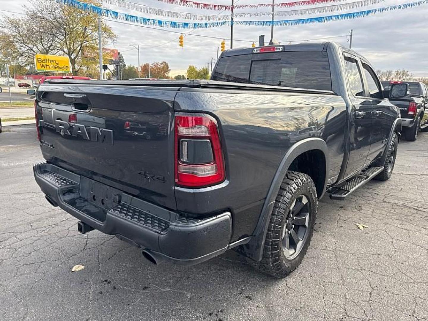 2019 GRAY /BLACK RAM 1500 Rebel Quad Cab 4WD (1C6SRFET0KN) with an 3.6L V6 FFV engine, 8A transmission, located at 3304 Woodville Road, Northwood, OH, 43619, (419) 210-8019, 41.612694, -83.480743 - Your #1 Destination for Auto Loans and mdash;No Matter Your Credit!At our dealership, we believe everyone deserves the opportunity to drive their dream car and mdash;whether you have good credit, bad credit, or no credit at all. With a wide selection of hundreds of cars, trucks, and SUVs, you'll fin - Photo#4