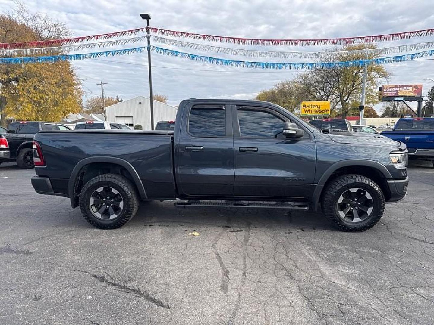 2019 GRAY /BLACK RAM 1500 Rebel Quad Cab 4WD (1C6SRFET0KN) with an 3.6L V6 FFV engine, 8A transmission, located at 3304 Woodville Road, Northwood, OH, 43619, (419) 210-8019, 41.612694, -83.480743 - Your #1 Destination for Auto Loans and mdash;No Matter Your Credit!At our dealership, we believe everyone deserves the opportunity to drive their dream car and mdash;whether you have good credit, bad credit, or no credit at all. With a wide selection of hundreds of cars, trucks, and SUVs, you'll fin - Photo#5