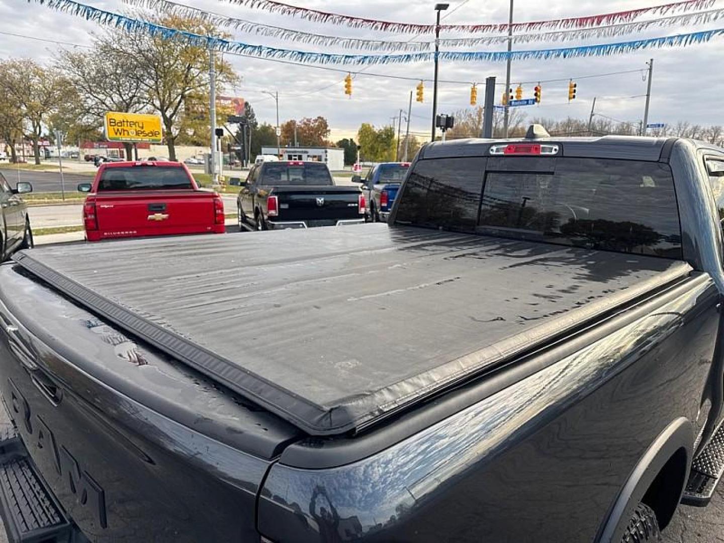 2019 GRAY /BLACK RAM 1500 Rebel Quad Cab 4WD (1C6SRFET0KN) with an 3.6L V6 FFV engine, 8A transmission, located at 3304 Woodville Road, Northwood, OH, 43619, (419) 210-8019, 41.612694, -83.480743 - Your #1 Destination for Auto Loans and mdash;No Matter Your Credit!At our dealership, we believe everyone deserves the opportunity to drive their dream car and mdash;whether you have good credit, bad credit, or no credit at all. With a wide selection of hundreds of cars, trucks, and SUVs, you'll fin - Photo#13