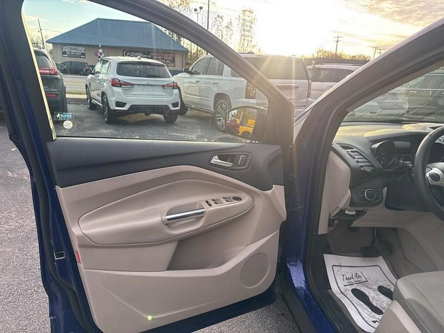 2016 BLUE /GRAY Ford Escape SE 4WD (1FMCU9GX0GU) with an 1.6L L4 DOHC 16V engine, 6-Speed Automatic transmission, located at 3304 Woodville Road, Northwood, OH, 43619, (419) 210-8019, 41.612694, -83.480743 - Your #1 Destination for Auto Loans and mdash;No Matter Your Credit!At our dealership, we believe everyone deserves the opportunity to drive their dream car and mdash;whether you have good credit, bad credit, or no credit at all. With a wide selection of hundreds of cars, trucks, and SUVs, you'll fin - Photo#9