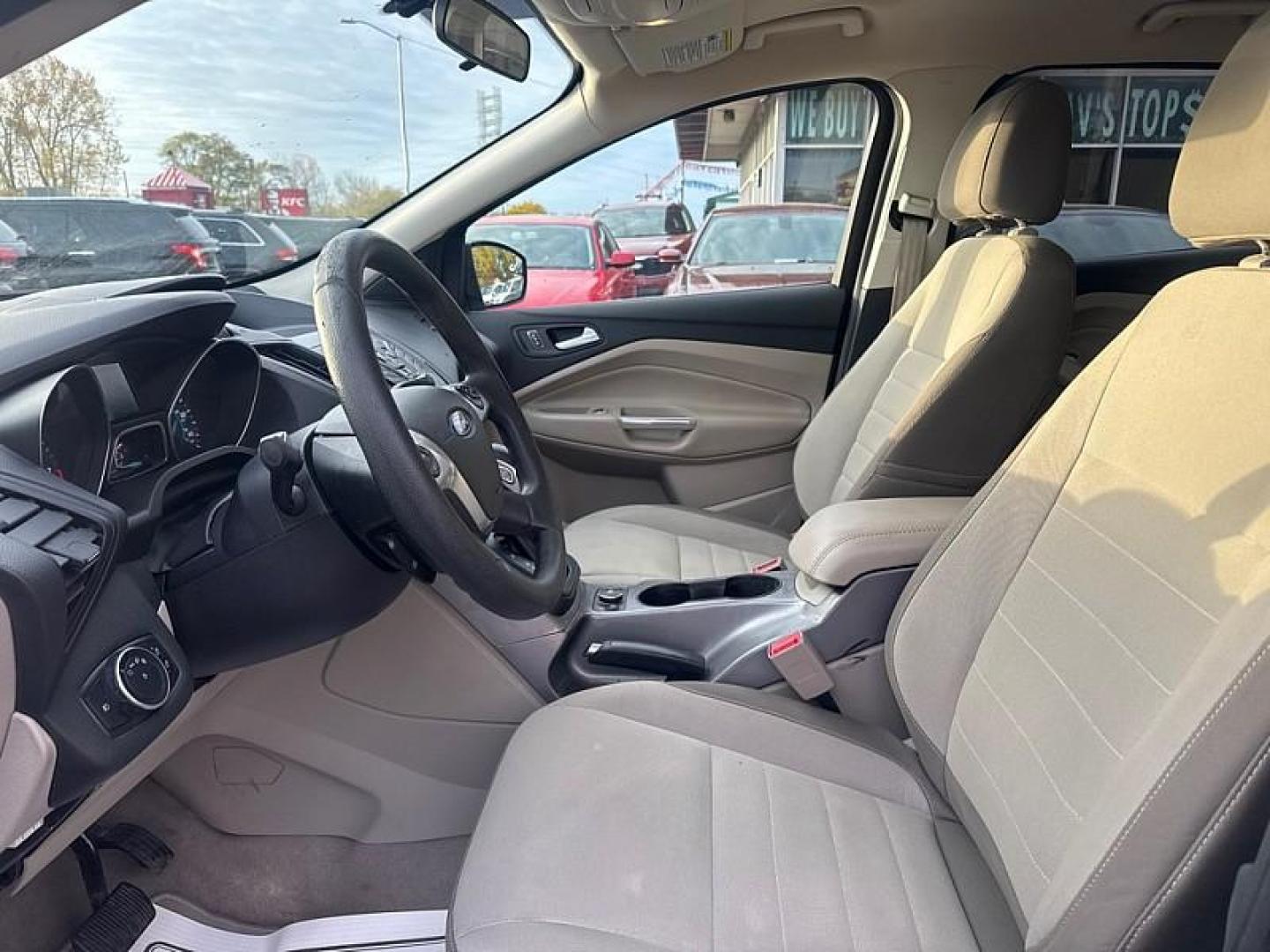 2016 BLUE /GRAY Ford Escape SE 4WD (1FMCU9GX0GU) with an 1.6L L4 DOHC 16V engine, 6-Speed Automatic transmission, located at 3304 Woodville Road, Northwood, OH, 43619, (419) 210-8019, 41.612694, -83.480743 - Your #1 Destination for Auto Loans and mdash;No Matter Your Credit!At our dealership, we believe everyone deserves the opportunity to drive their dream car and mdash;whether you have good credit, bad credit, or no credit at all. With a wide selection of hundreds of cars, trucks, and SUVs, you'll fin - Photo#10