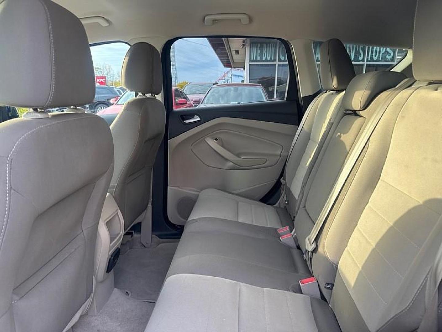 2016 BLUE /GRAY Ford Escape SE 4WD (1FMCU9GX0GU) with an 1.6L L4 DOHC 16V engine, 6-Speed Automatic transmission, located at 3304 Woodville Road, Northwood, OH, 43619, (419) 210-8019, 41.612694, -83.480743 - Your #1 Destination for Auto Loans and mdash;No Matter Your Credit!At our dealership, we believe everyone deserves the opportunity to drive their dream car and mdash;whether you have good credit, bad credit, or no credit at all. With a wide selection of hundreds of cars, trucks, and SUVs, you'll fin - Photo#12