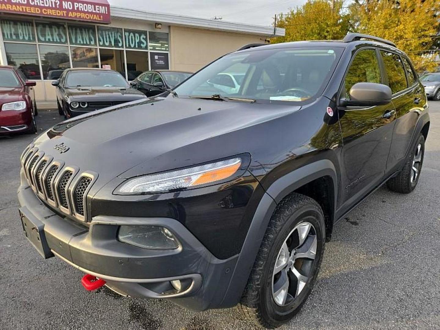 2015 BLACK /BLACK Jeep Cherokee Trailhawk 4WD (1C4PJMBS4FW) with an 3.2L V6 DOHC 24V engine, 9-Speed Automatic transmission, located at 3304 Woodville Road, Northwood, OH, 43619, (419) 210-8019, 41.612694, -83.480743 - Your #1 Destination for Auto Loans and mdash;No Matter Your Credit!At our dealership, we believe everyone deserves the opportunity to drive their dream car and mdash;whether you have good credit, bad credit, or no credit at all. With a wide selection of hundreds of cars, trucks, and SUVs, you'll fin - Photo#0
