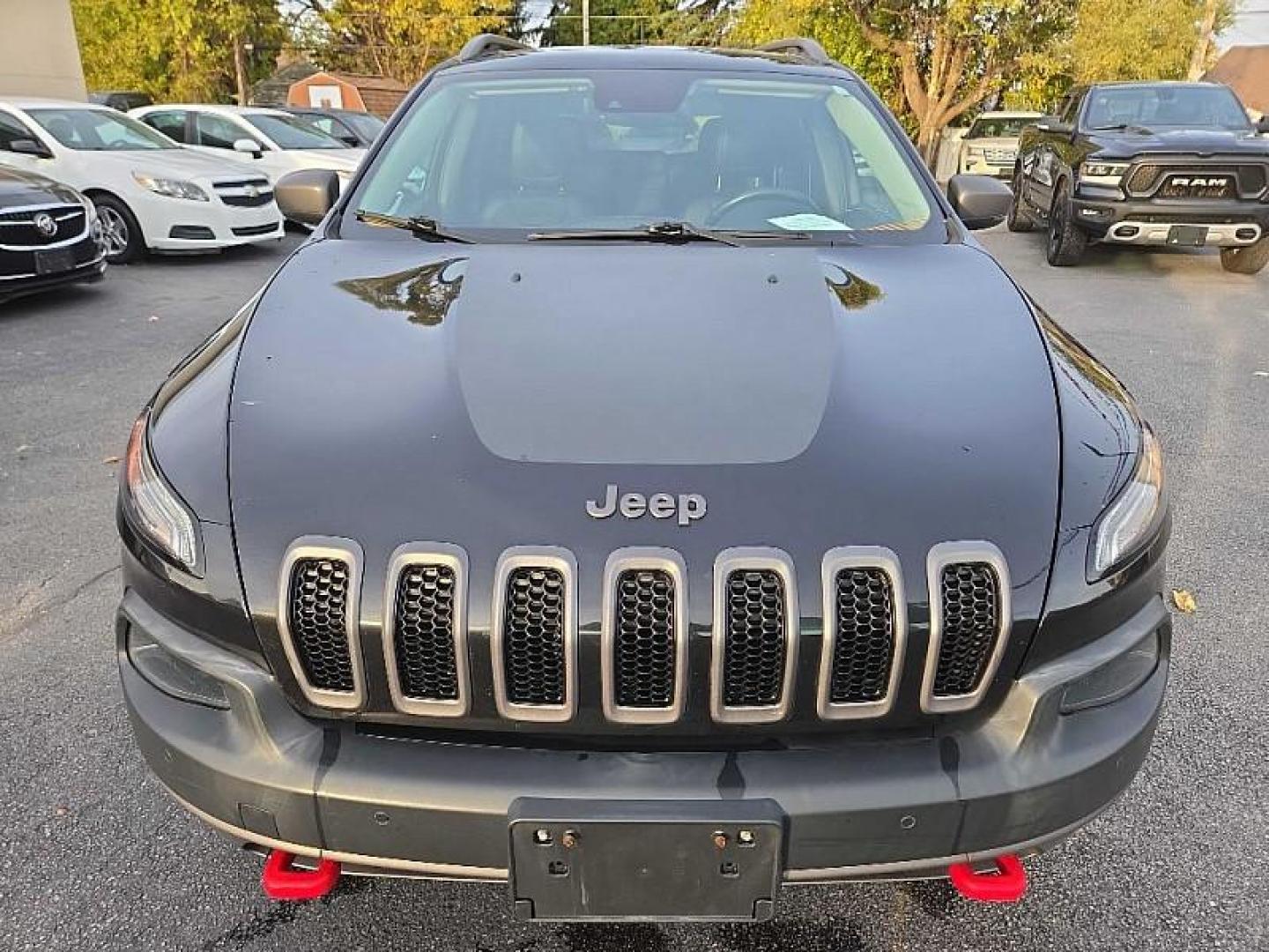 2015 BLACK /BLACK Jeep Cherokee Trailhawk 4WD (1C4PJMBS4FW) with an 3.2L V6 DOHC 24V engine, 9-Speed Automatic transmission, located at 3304 Woodville Road, Northwood, OH, 43619, (419) 210-8019, 41.612694, -83.480743 - Your #1 Destination for Auto Loans and mdash;No Matter Your Credit!At our dealership, we believe everyone deserves the opportunity to drive their dream car and mdash;whether you have good credit, bad credit, or no credit at all. With a wide selection of hundreds of cars, trucks, and SUVs, you'll fin - Photo#7
