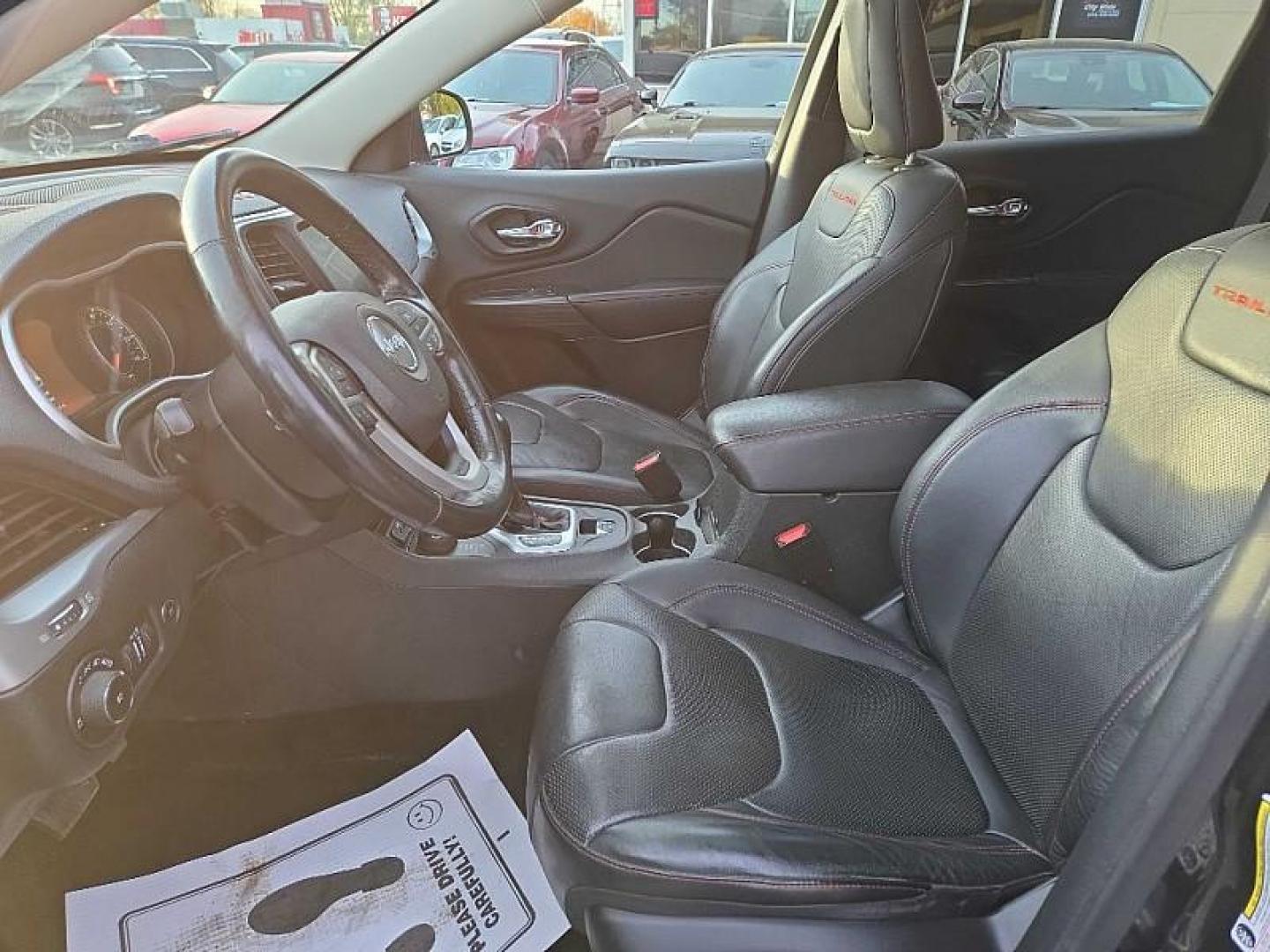 2015 BLACK /BLACK Jeep Cherokee Trailhawk 4WD (1C4PJMBS4FW) with an 3.2L V6 DOHC 24V engine, 9-Speed Automatic transmission, located at 3304 Woodville Road, Northwood, OH, 43619, (419) 210-8019, 41.612694, -83.480743 - Your #1 Destination for Auto Loans and mdash;No Matter Your Credit!At our dealership, we believe everyone deserves the opportunity to drive their dream car and mdash;whether you have good credit, bad credit, or no credit at all. With a wide selection of hundreds of cars, trucks, and SUVs, you'll fin - Photo#9