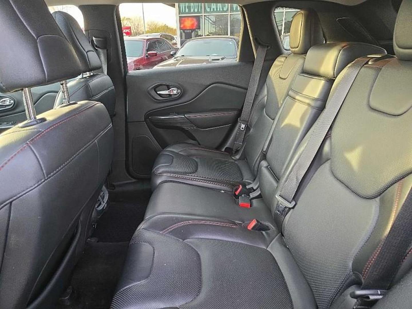 2015 BLACK /BLACK Jeep Cherokee Trailhawk 4WD (1C4PJMBS4FW) with an 3.2L V6 DOHC 24V engine, 9-Speed Automatic transmission, located at 3304 Woodville Road, Northwood, OH, 43619, (419) 210-8019, 41.612694, -83.480743 - Your #1 Destination for Auto Loans and mdash;No Matter Your Credit!At our dealership, we believe everyone deserves the opportunity to drive their dream car and mdash;whether you have good credit, bad credit, or no credit at all. With a wide selection of hundreds of cars, trucks, and SUVs, you'll fin - Photo#11