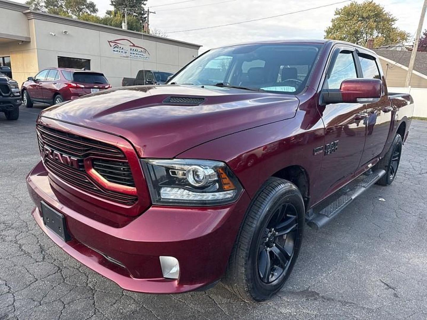 2018 MAROON /BLACK RAM 1500 Sport Crew Cab SWB 4WD (1C6RR7MTXJS) with an 5.7L V8 OHV 16V engine, 8A transmission, located at 3304 Woodville Road, Northwood, OH, 43619, (419) 210-8019, 41.612694, -83.480743 - Your #1 Destination for Auto Loans and mdash;No Matter Your Credit!At our dealership, we believe everyone deserves the opportunity to drive their dream car and mdash;whether you have good credit, bad credit, or no credit at all. With a wide selection of hundreds of cars, trucks, and SUVs, you'll fin - Photo#0