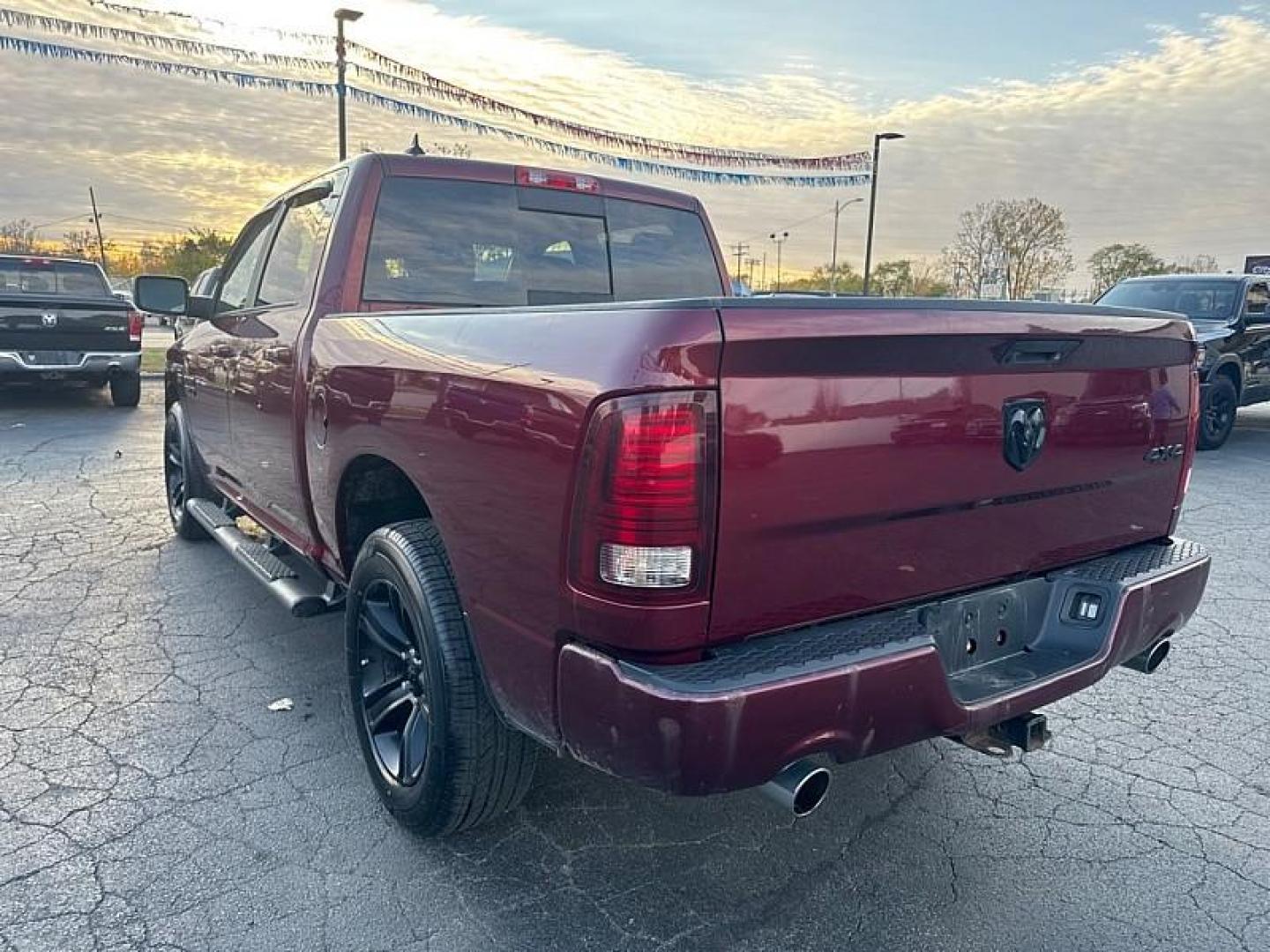 2018 MAROON /BLACK RAM 1500 Sport Crew Cab SWB 4WD (1C6RR7MTXJS) with an 5.7L V8 OHV 16V engine, 8A transmission, located at 3304 Woodville Road, Northwood, OH, 43619, (419) 210-8019, 41.612694, -83.480743 - Your #1 Destination for Auto Loans and mdash;No Matter Your Credit!At our dealership, we believe everyone deserves the opportunity to drive their dream car and mdash;whether you have good credit, bad credit, or no credit at all. With a wide selection of hundreds of cars, trucks, and SUVs, you'll fin - Photo#2