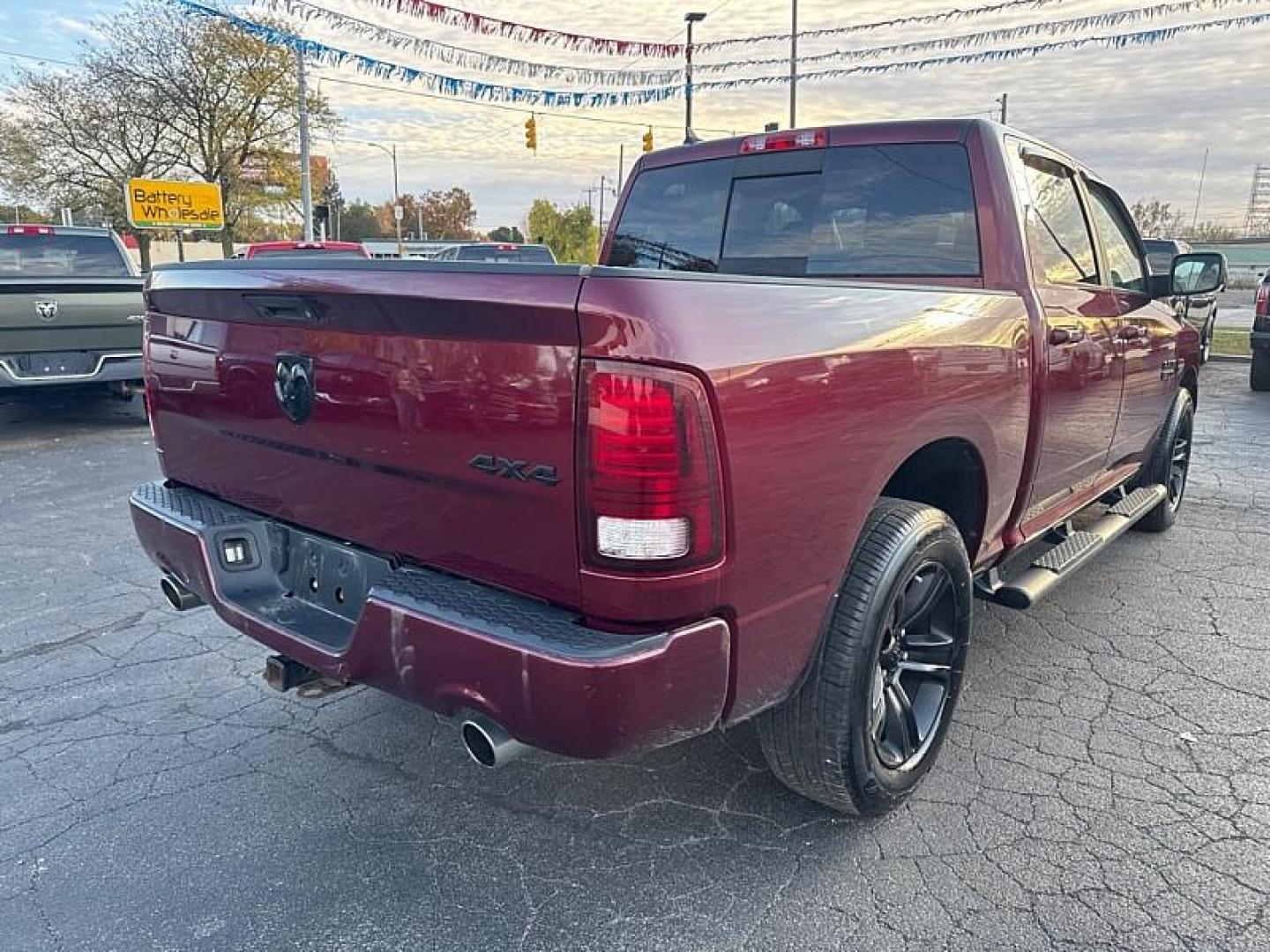 2018 MAROON /BLACK RAM 1500 Sport Crew Cab SWB 4WD (1C6RR7MTXJS) with an 5.7L V8 OHV 16V engine, 8A transmission, located at 3304 Woodville Road, Northwood, OH, 43619, (419) 210-8019, 41.612694, -83.480743 - Your #1 Destination for Auto Loans and mdash;No Matter Your Credit!At our dealership, we believe everyone deserves the opportunity to drive their dream car and mdash;whether you have good credit, bad credit, or no credit at all. With a wide selection of hundreds of cars, trucks, and SUVs, you'll fin - Photo#4