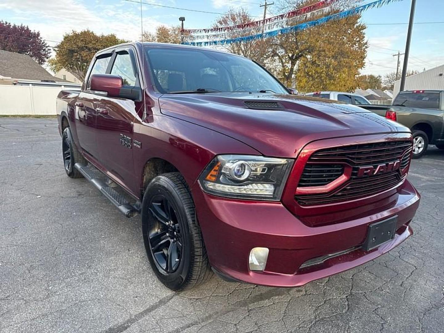 2018 MAROON /BLACK RAM 1500 Sport Crew Cab SWB 4WD (1C6RR7MTXJS) with an 5.7L V8 OHV 16V engine, 8A transmission, located at 3304 Woodville Road, Northwood, OH, 43619, (419) 210-8019, 41.612694, -83.480743 - Your #1 Destination for Auto Loans and mdash;No Matter Your Credit!At our dealership, we believe everyone deserves the opportunity to drive their dream car and mdash;whether you have good credit, bad credit, or no credit at all. With a wide selection of hundreds of cars, trucks, and SUVs, you'll fin - Photo#6