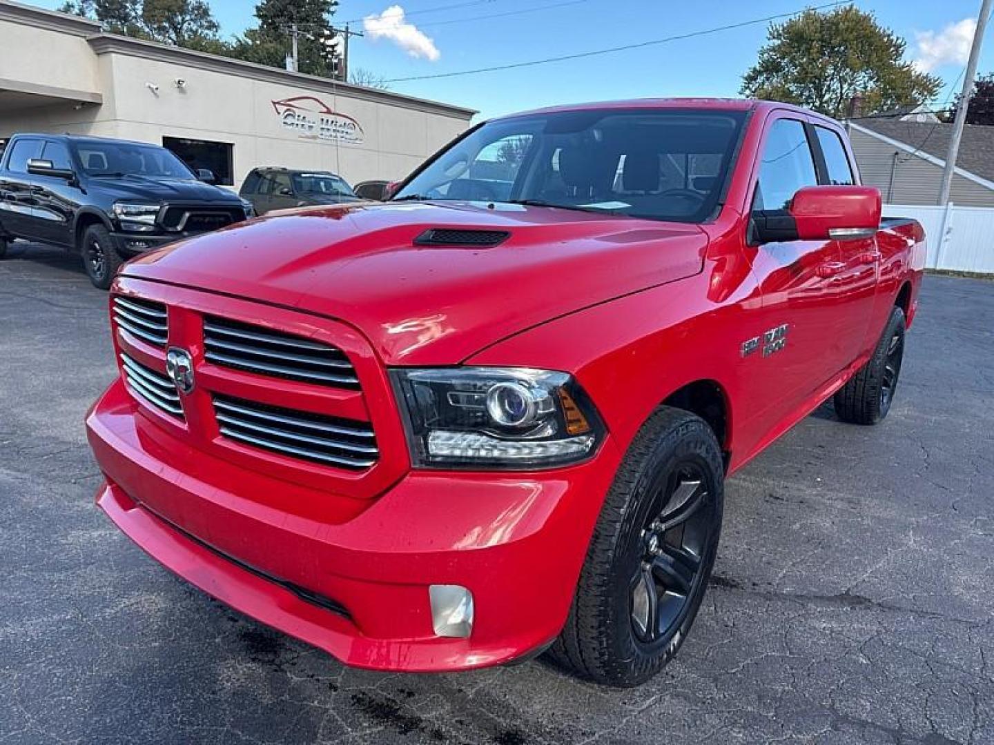 2015 RED /BLACK RAM 1500 Sport Quad Cab 4WD (1C6RR7HT0FS) with an 5.7L V8 OHV 16V engine, 6-Speed Automatic transmission, located at 3304 Woodville Road, Northwood, OH, 43619, (419) 210-8019, 41.612694, -83.480743 - Your #1 Destination for Auto Loans and mdash;No Matter Your Credit!At our dealership, we believe everyone deserves the opportunity to drive their dream car and mdash;whether you have good credit, bad credit, or no credit at all. With a wide selection of hundreds of cars, trucks, and SUVs, you'll fin - Photo#0