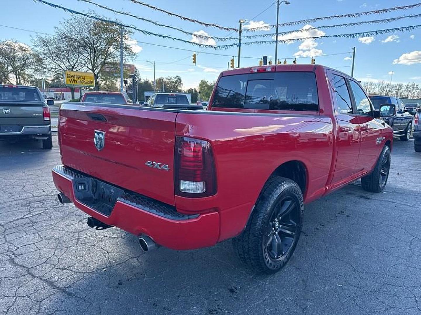 2015 RED /BLACK RAM 1500 Sport Quad Cab 4WD (1C6RR7HT0FS) with an 5.7L V8 OHV 16V engine, 6-Speed Automatic transmission, located at 3304 Woodville Road, Northwood, OH, 43619, (419) 210-8019, 41.612694, -83.480743 - Your #1 Destination for Auto Loans and mdash;No Matter Your Credit!At our dealership, we believe everyone deserves the opportunity to drive their dream car and mdash;whether you have good credit, bad credit, or no credit at all. With a wide selection of hundreds of cars, trucks, and SUVs, you'll fin - Photo#4